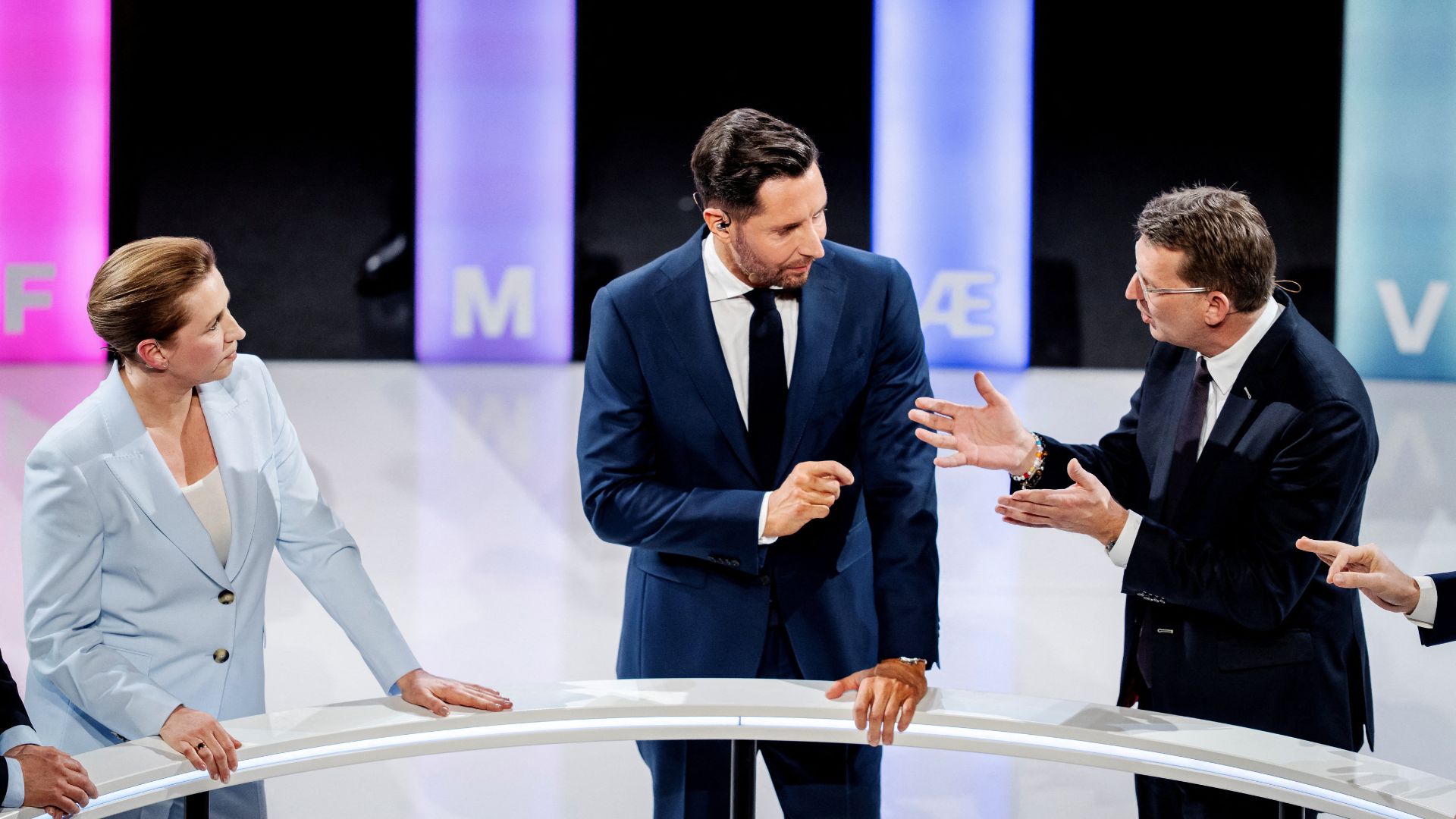 Prime Minister Mette Frederiksen (L) and Troels Lund Poulsen (R) attend the party leader debate Democracy's Evening in Copenhagen two days before the election. /Mads Claus Rasmussen/Ritzau Scanpix

