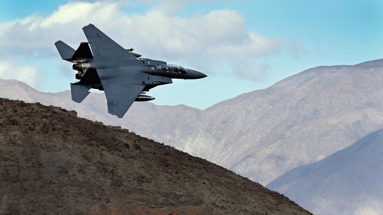 FILE PHOTO: F-15E Strike Eagle turns toward the Panamint range over Death Valley National Park, on February 27, 2017. (AP Photo/Ben Margot, File)