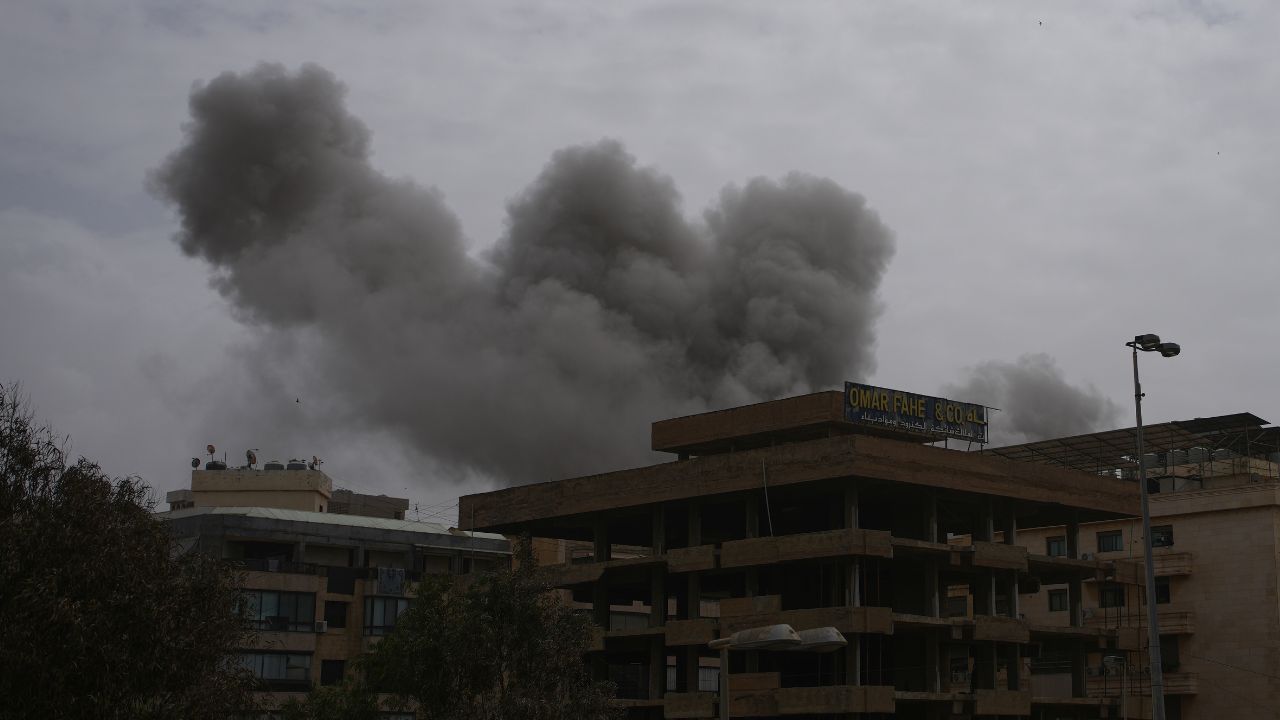 Smoke rises following an Israeli airstrike that hit a building south of Beirut, Lebanon, Sunday, April 5, 2026. (AP Photo/Emilio Morenatti)