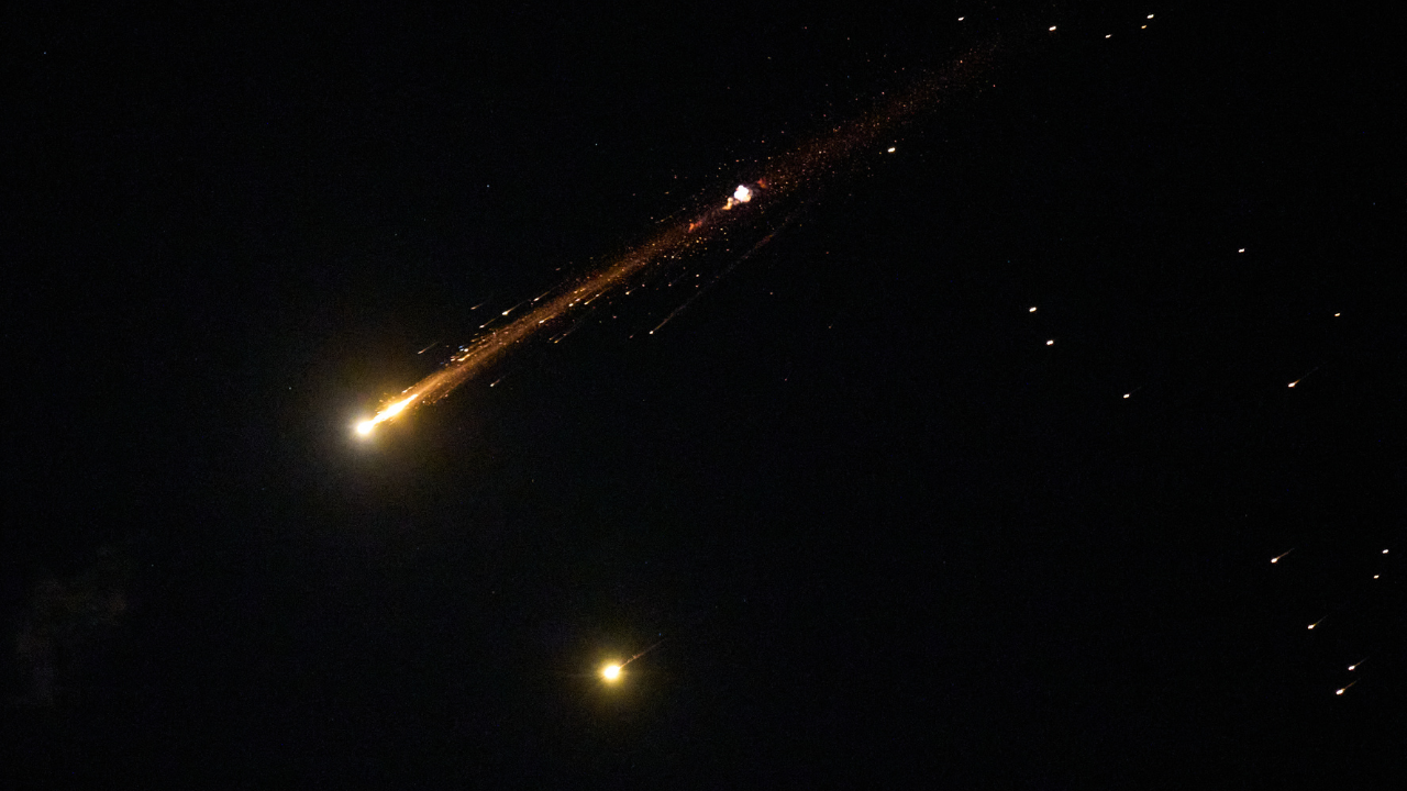 An Iranian cluster munition missile explodes in the sky over northern Israel, Wednesday, April 8, 2026. /AP Photo/Ariel Schalit