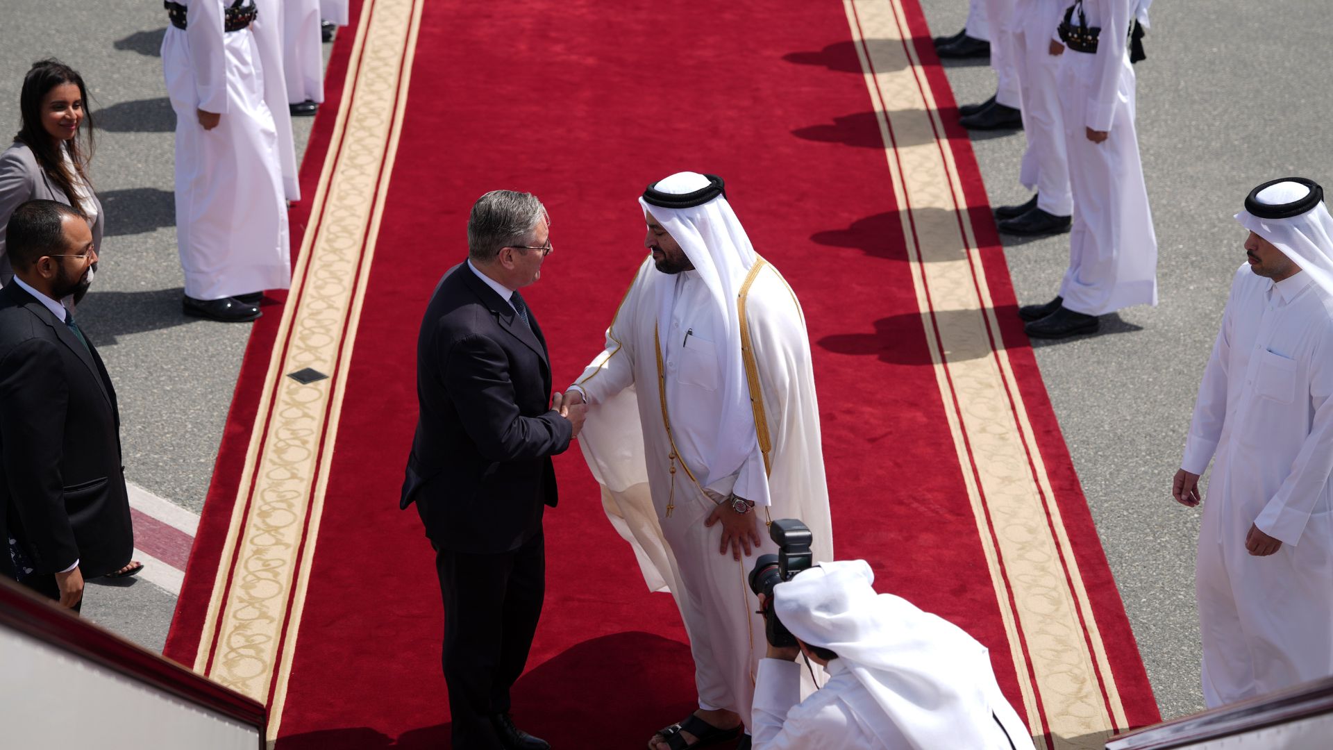 Qatar's Minister of State Muhammed Al Khulaifi bids farewell to Britain's Prime Minister Keir Starmer at the airport in Doha, Qatar, Friday, April 10 after his three day visit to the Gulf region. /Alastair Grant/AP