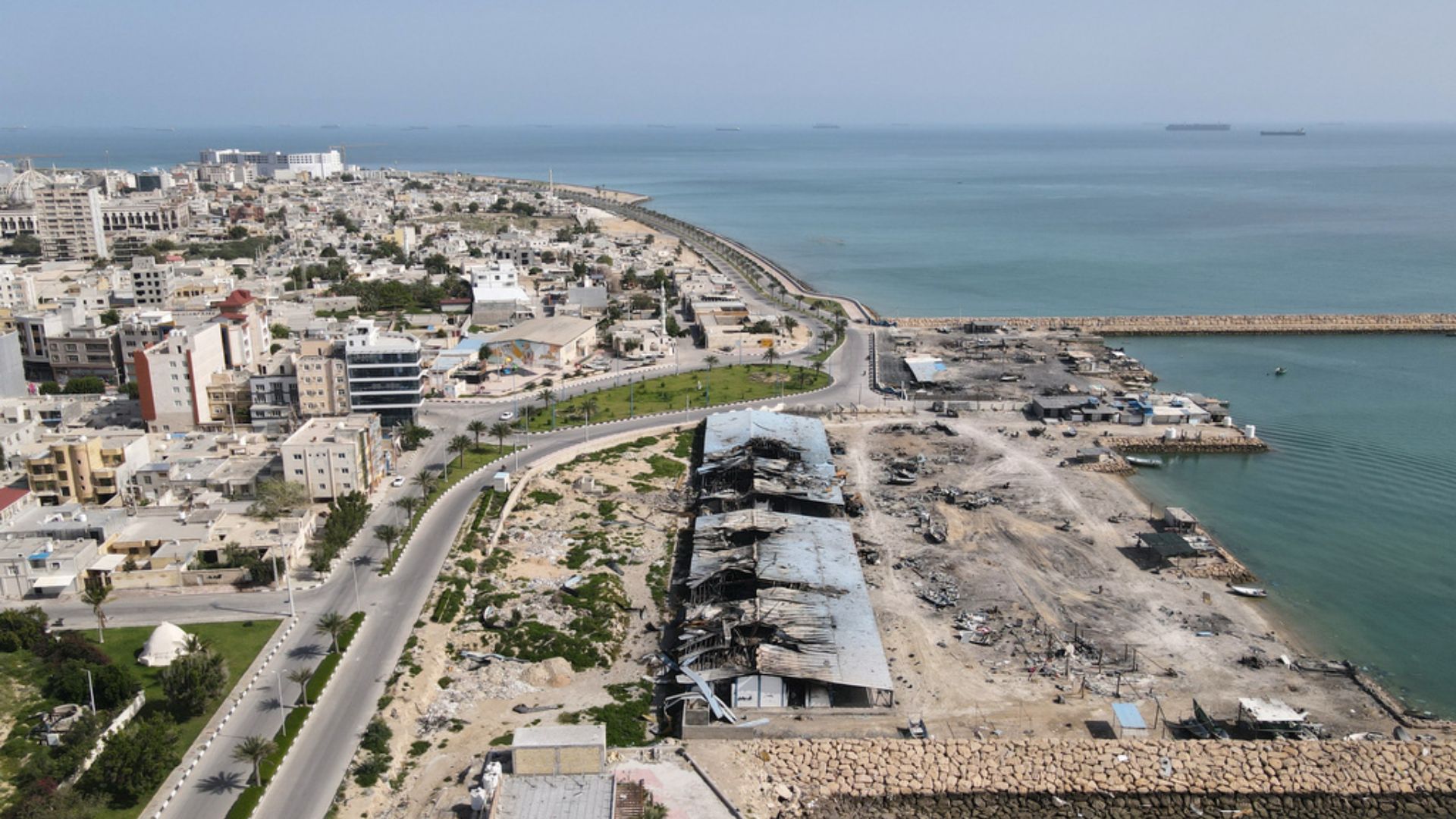 Damage – caused, according to local witnesses, by several recent airstrikes during the US-Israel military campaign – at a fishing pier in the port of Qeshm island. /Asghar Besharati/AP