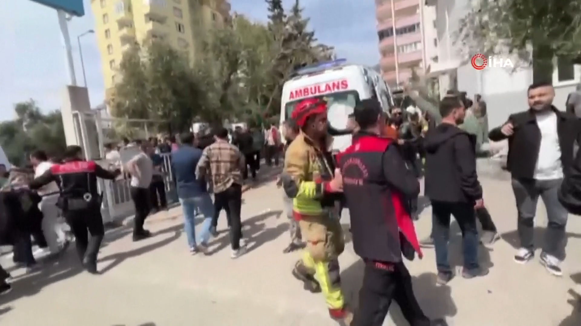 Shocked crowds gather at the school. /IHA/AP