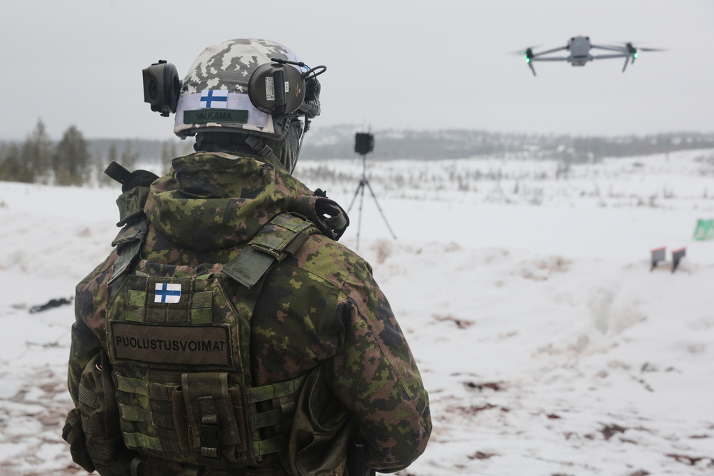 Finnish Staff Sergeant Ville Valkama operates a drone at the Rovajaervi Training Area during NATO arctic exercise Cold Response in Rovaniemi, Finland. /Aino Vaananen/AP Photo