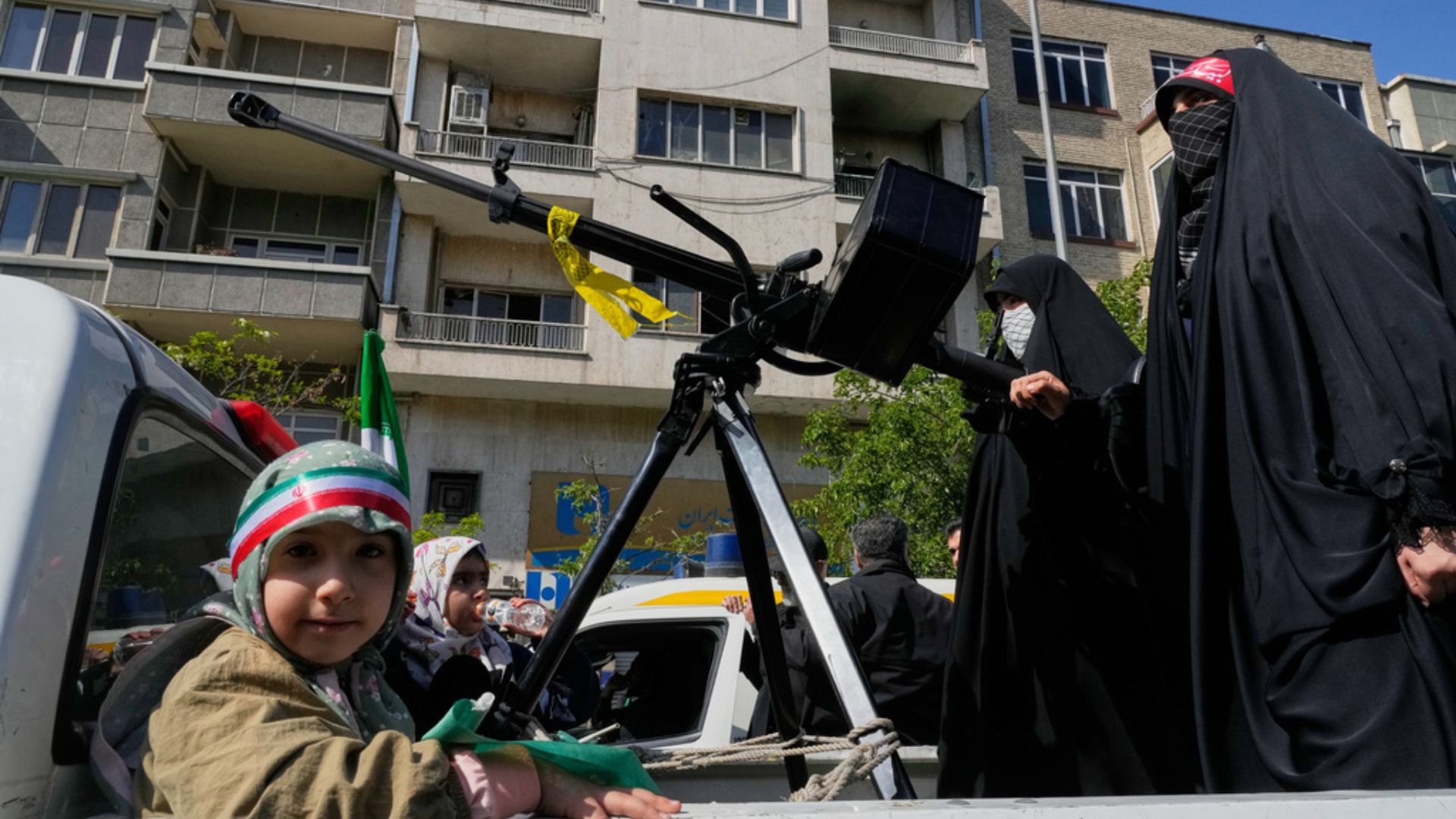Women members of the Basij paramilitary mark National Girl's Day in Tehran on Friday./ Vahid Salemi/AP
