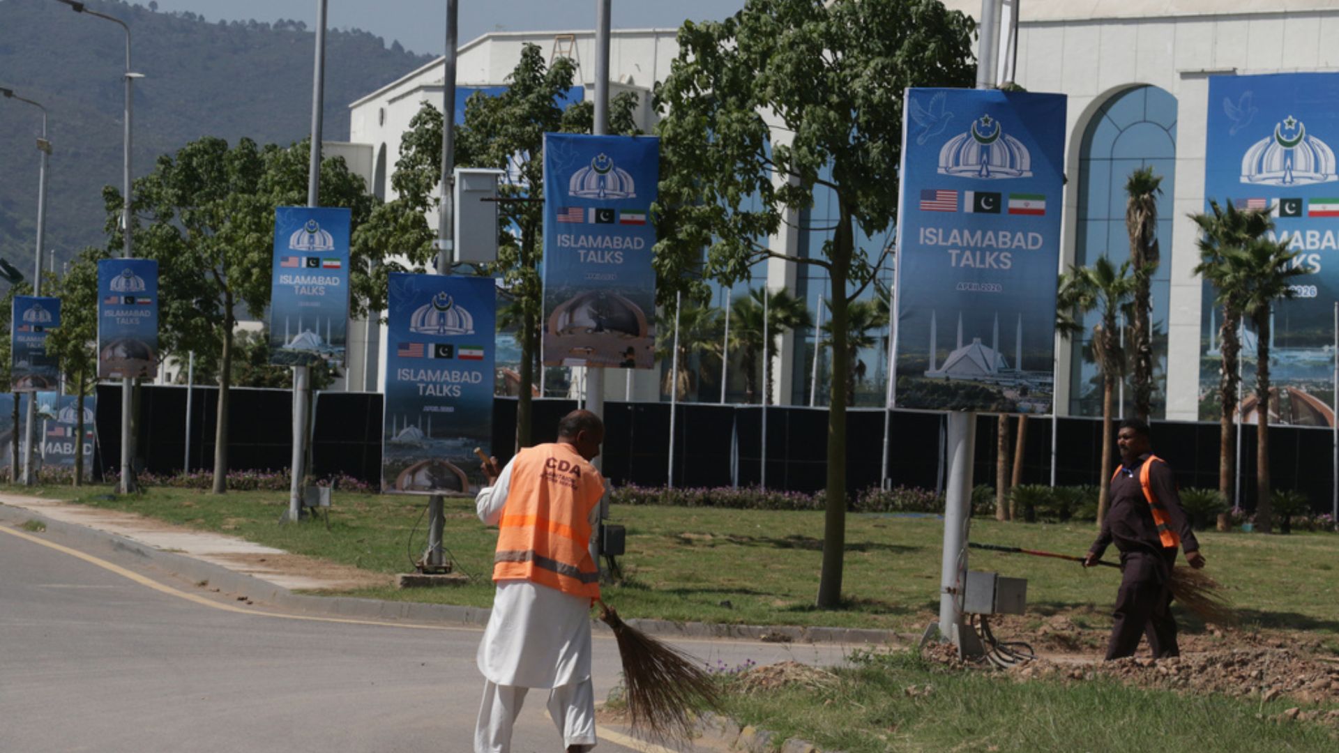 Billboards on Sunday promoting US-Iran talks ahead of a second round of the US-Iran officials talks, in Islamabad./ Ehsan Shahzad/AP