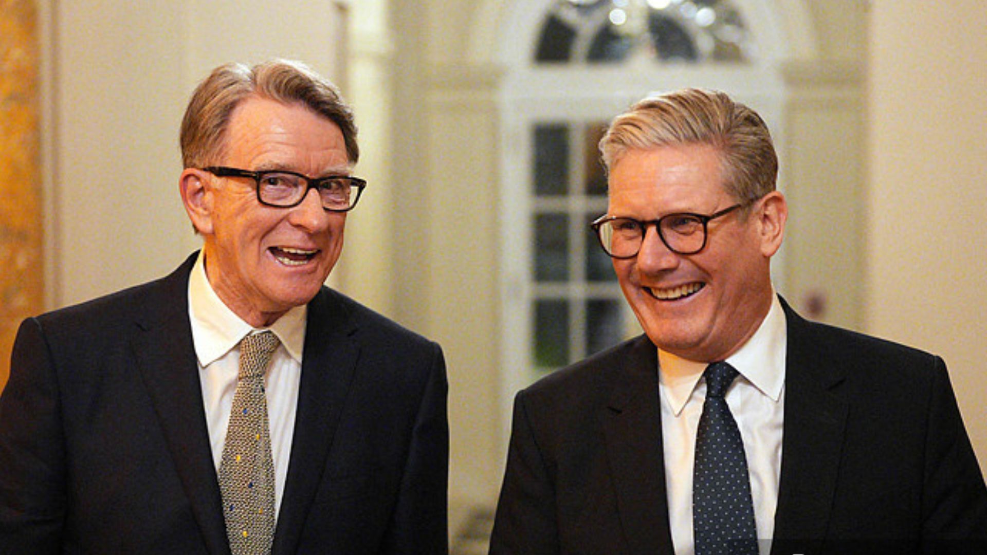 Happier times, on February 26, 2025, in Washington, D.C., as Starmer (right) speaks with British Ambassador to the United States Peter Mandelson at a welcoming reception held at the British Ambassador's residence. /Carl Court/Pool