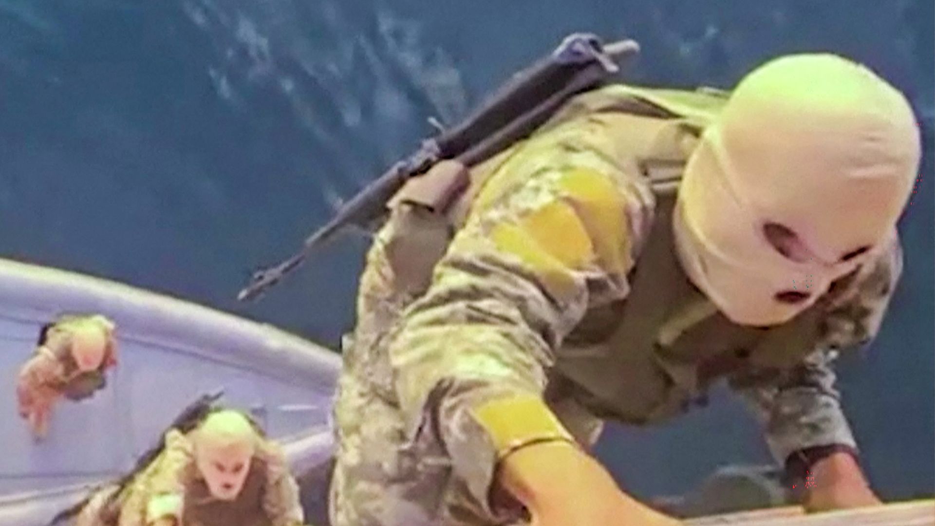 A screen grab taken from undated video footage released by Iran's Revolutionary Guards (IRGC) shows IRGC naval forces allegedly boarding a ship attempting to cross the Strait of Hormuz. /Irib TV via AFP
