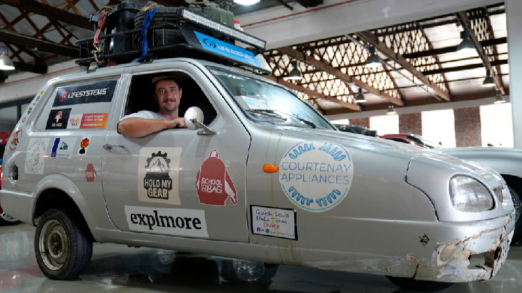 Two friends set record by driving three-wheel car the length of Africa