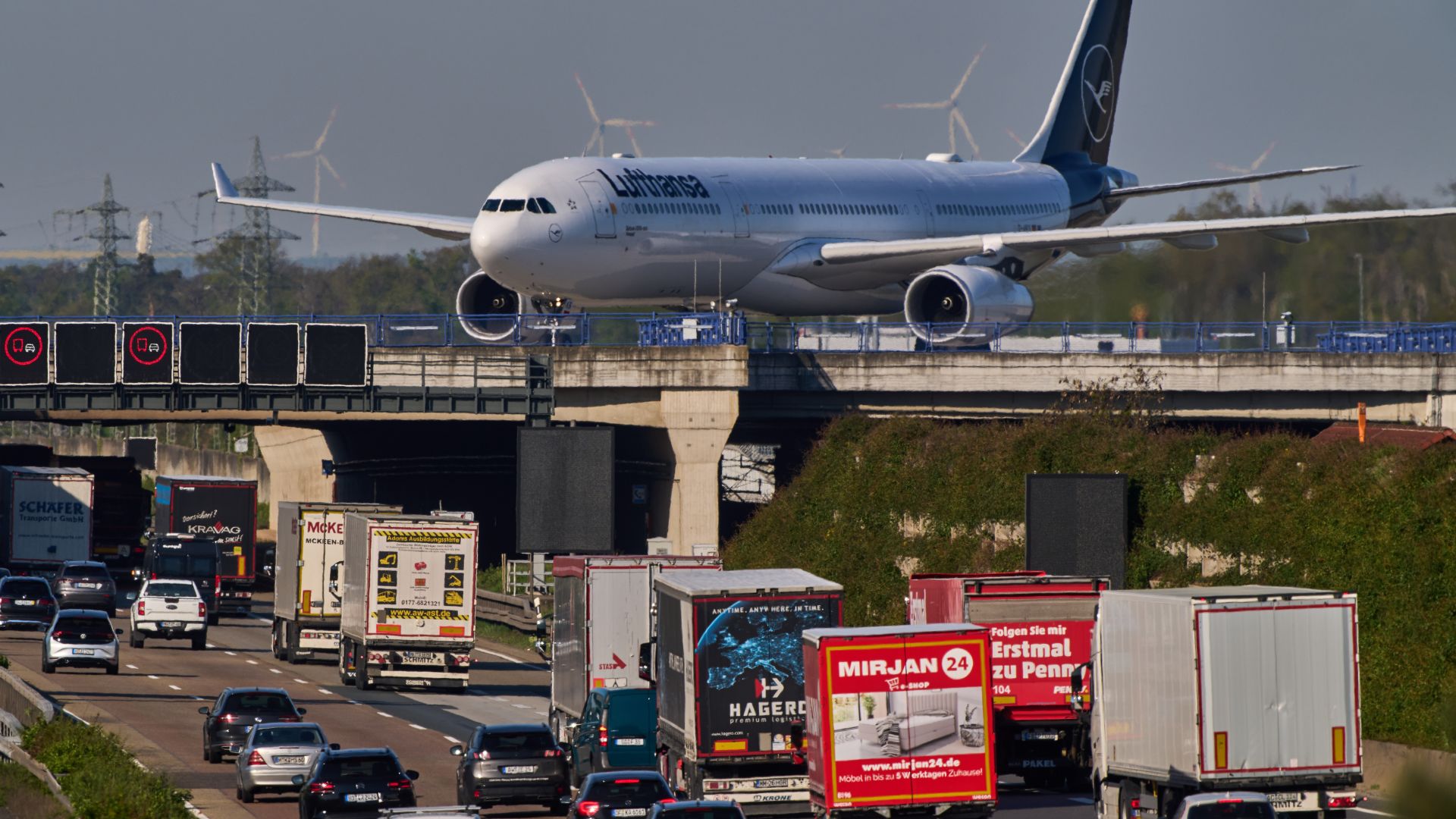 A Lufthansa aircraft rolls on a bridge over a highway at the airport in Frankfurt, Germany, Wednesday, April 22, 2026. /AP Photo/Michael Probst