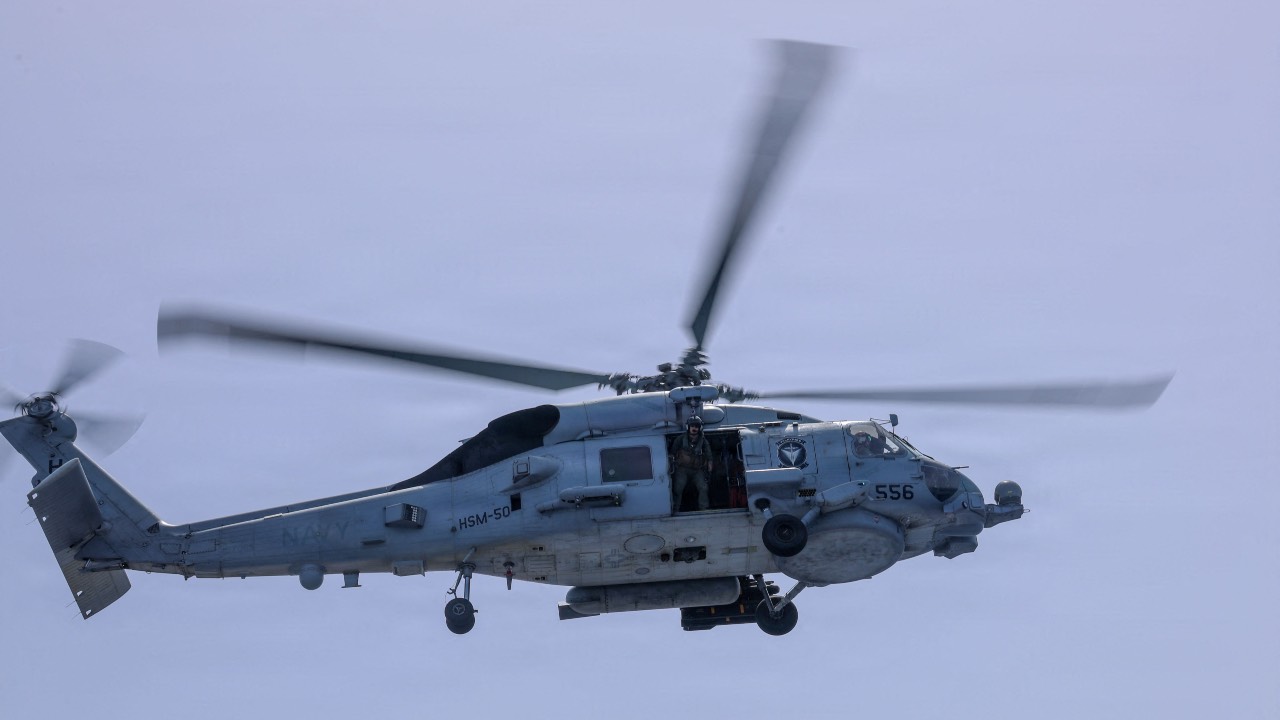 An MH-60R Sea Hawk helicopter, assigned to Helicopter Maritime Strike Squadron (HSM) 50, taking off from the flight deck of Arleigh Burke-class guided-missile destroyer USS Thomas Hudner (DDG 116). /US Navy/AFP