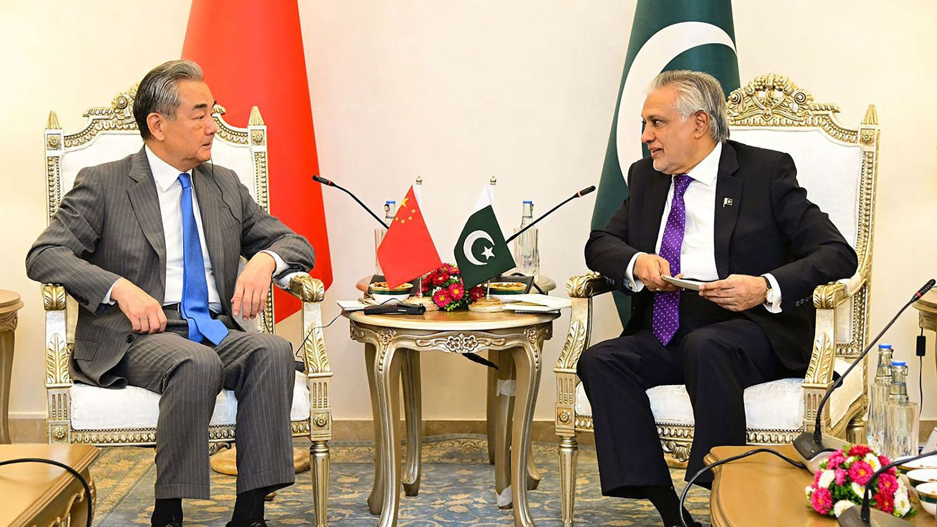 Wang Yi and Ishaq Dar meeting in Islamabad last August. /Pakistan's Ministry of Foreign Affairs Handout
