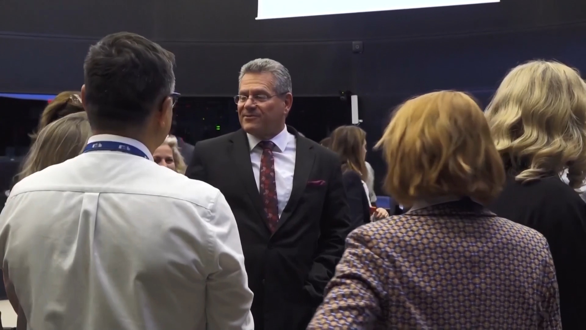 EU Trade Commissioner Maris Sefcovic (center), pictured after negotiations, said 'The EU walks the talk'. /Reuters