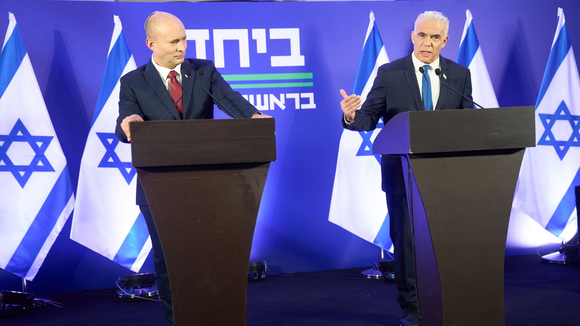 Former Israeli prime ministers Naftali Bennett, left, and Yair Lapid have formed a new party. /Ariel Schalit/AP

