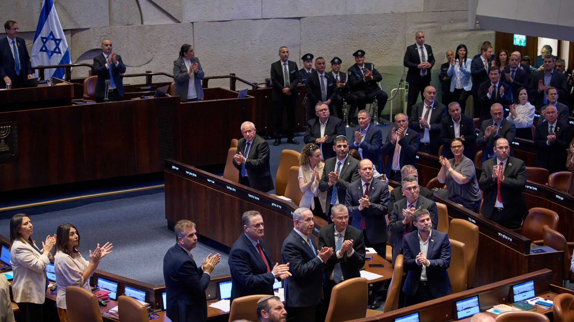After voting to dissolve parliament, Knesset members will have to agree on an election date. /Ohad Zwigenberg/AP
