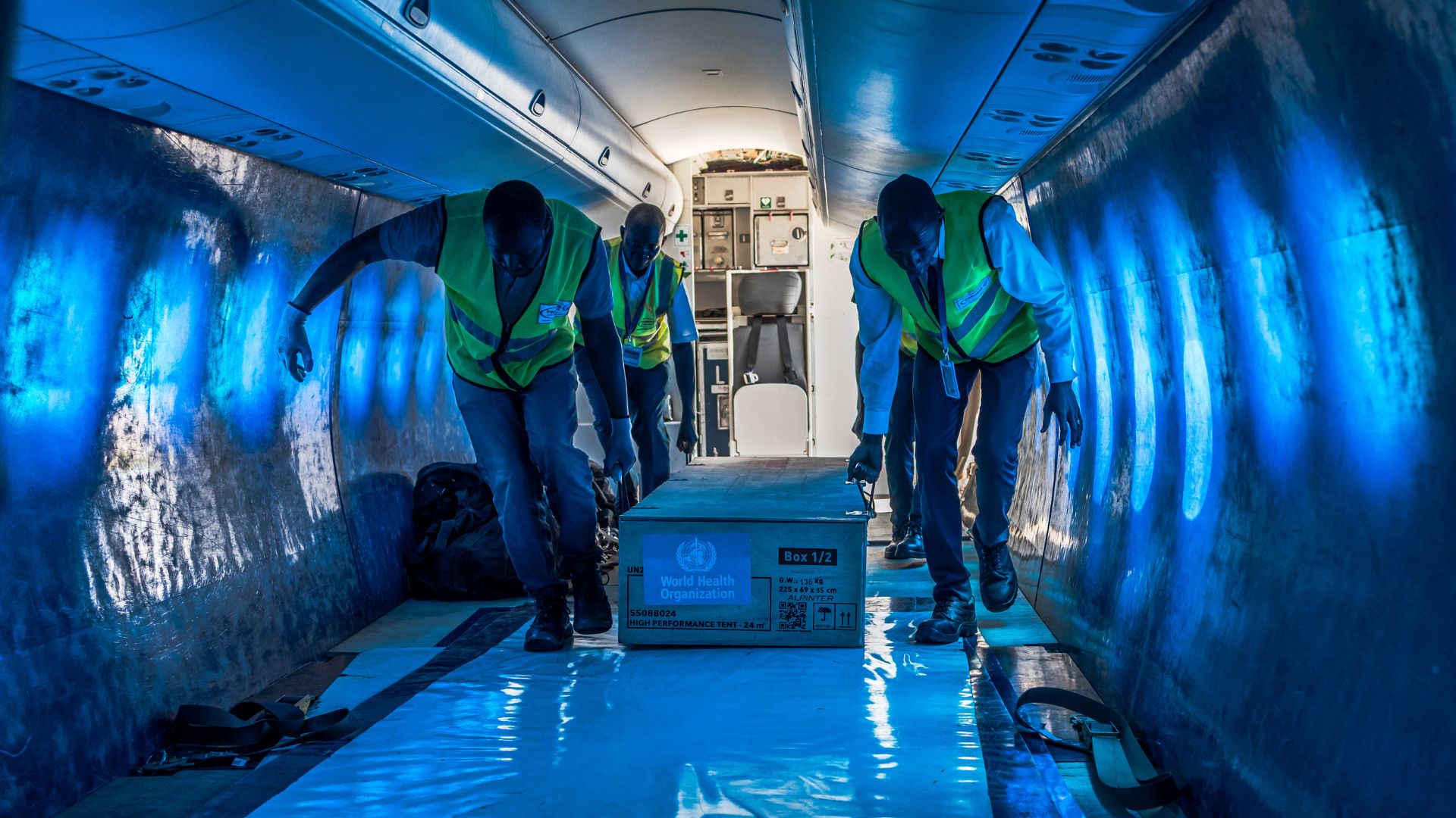 Ground crew load medical supplies onto a United Nations Humanitarian Air Service (UNHAS) charter plane bound for Bunia in DR Congo as the WHO coordinates the response to an Ebola outbreak. /Tony Karumba/AFP
