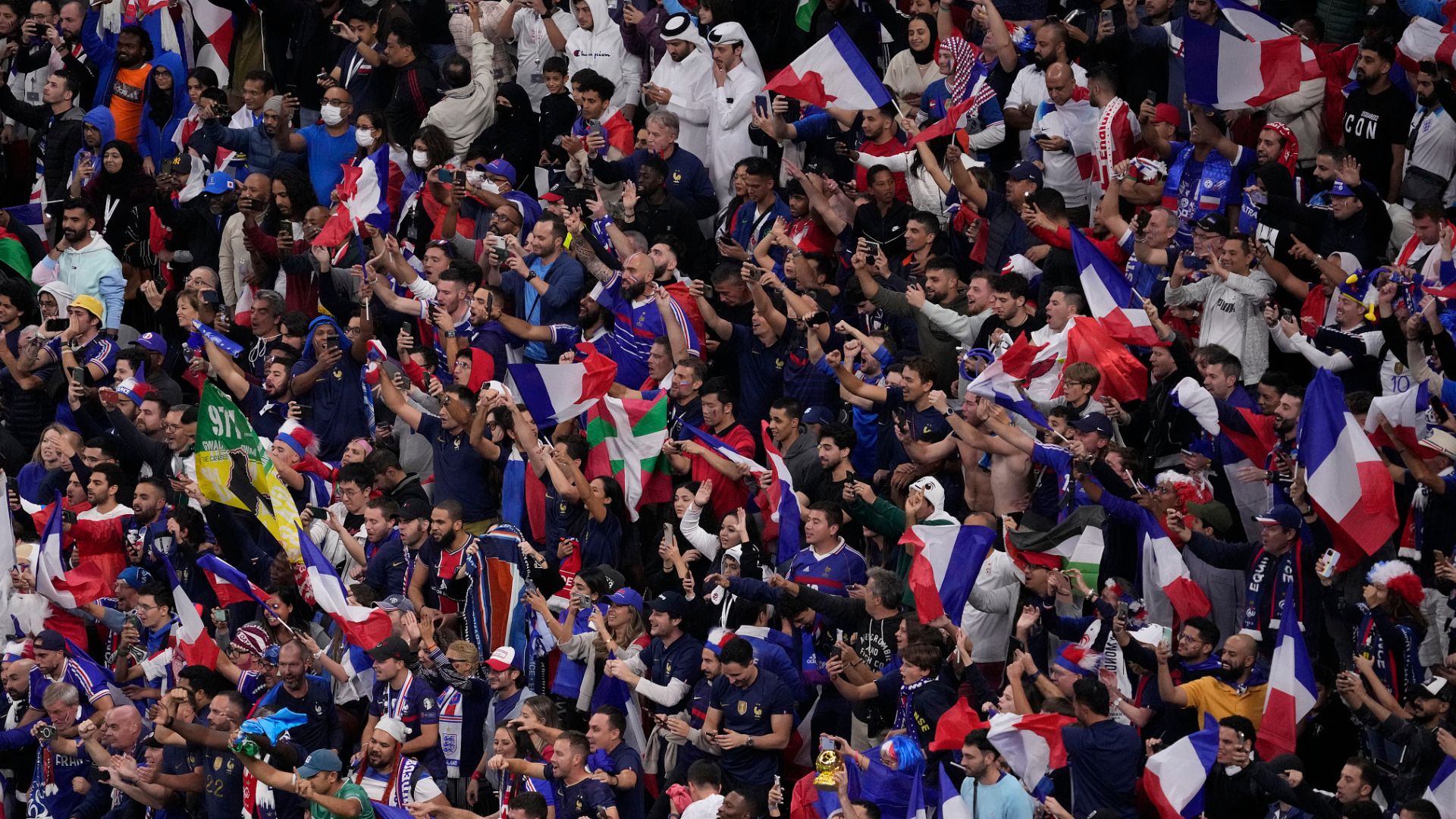 French fans celebrate at the Al Bayt Stadium in Al Khor, Qatar after knocking out England at the last World Cup. /Darko Bandic via CFP