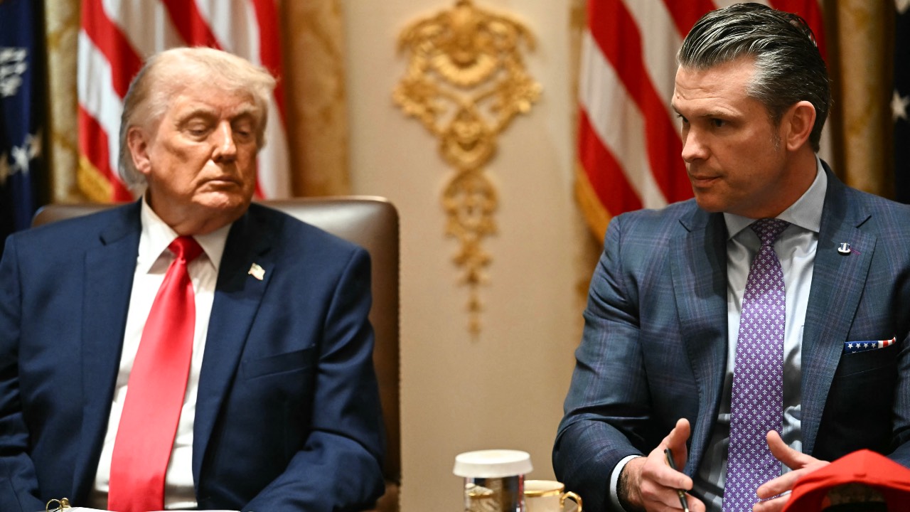 US President Donald Trump listens to Defense Secretary Pete Hegseth speak during a cabinet meeting in the Cabinet Room of the White House in Washington, DC. Kent Nishimura/AFP
