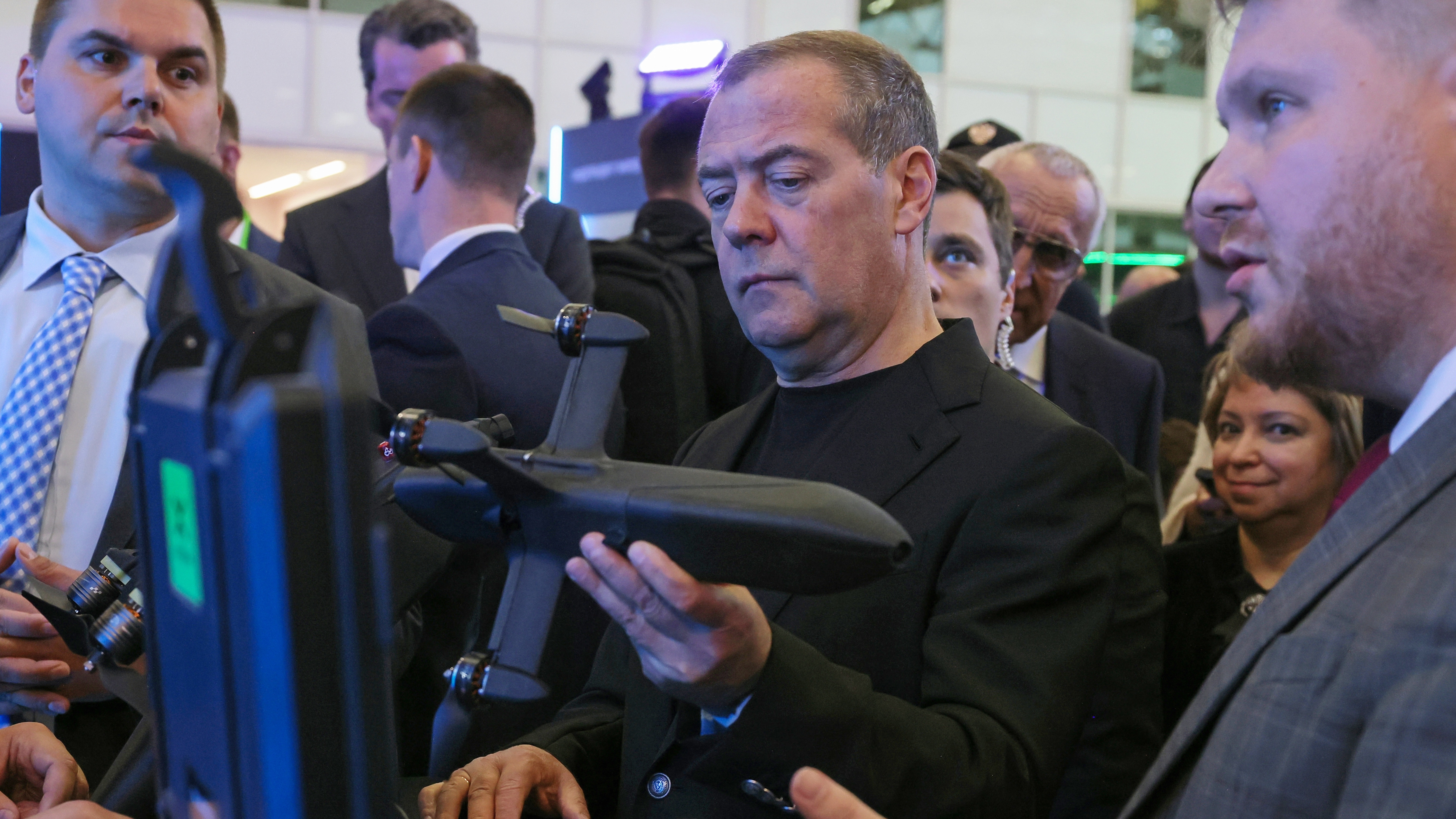 Deputy Chairman of the Russian Security Council Dmitry Medvedev examines a drone at the Startup Village international technology conference at the Skolkovo Innovation Center in Moscow, Thursday, May 28, 2026. /Ekaterina Shtukina, Sputnik Pool Photo via AP