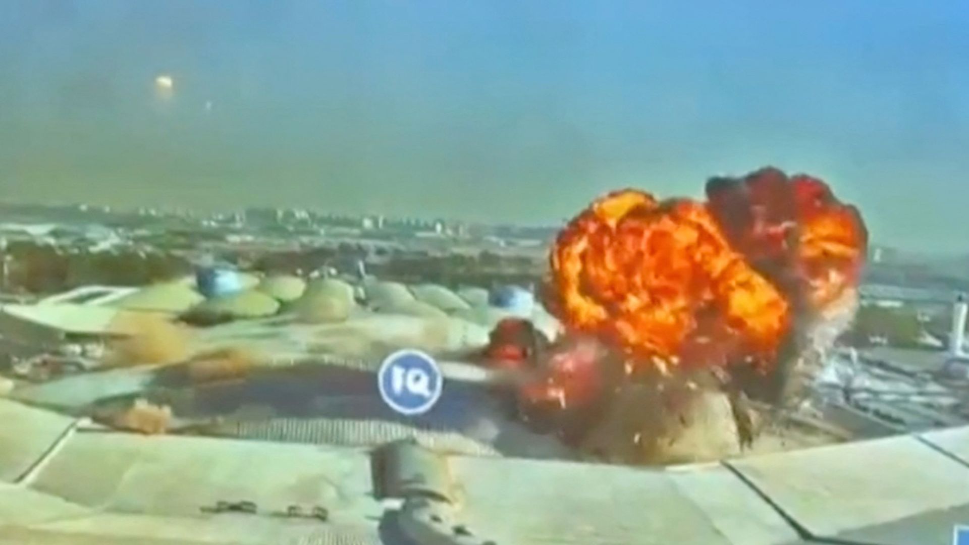 This grab taken from the CCTV images released by Kuwait's Directorate General of Civil Aviation (DGCA) shows an explosion following a drone strike at Terminal 1 (T1) of Kuwait International Airport. /DGCA/AFP
