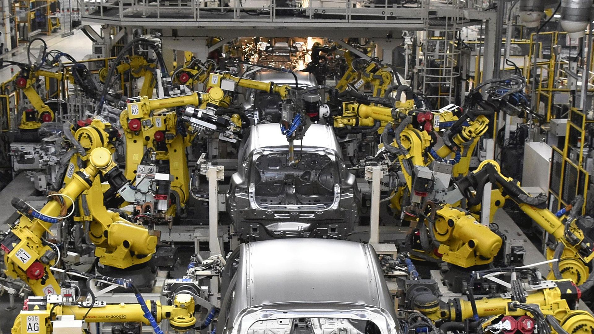Robots have long been used in factory manufacturing but a new AI revolution could take their use to the next level. /Yomiuri Shimbun via AP
