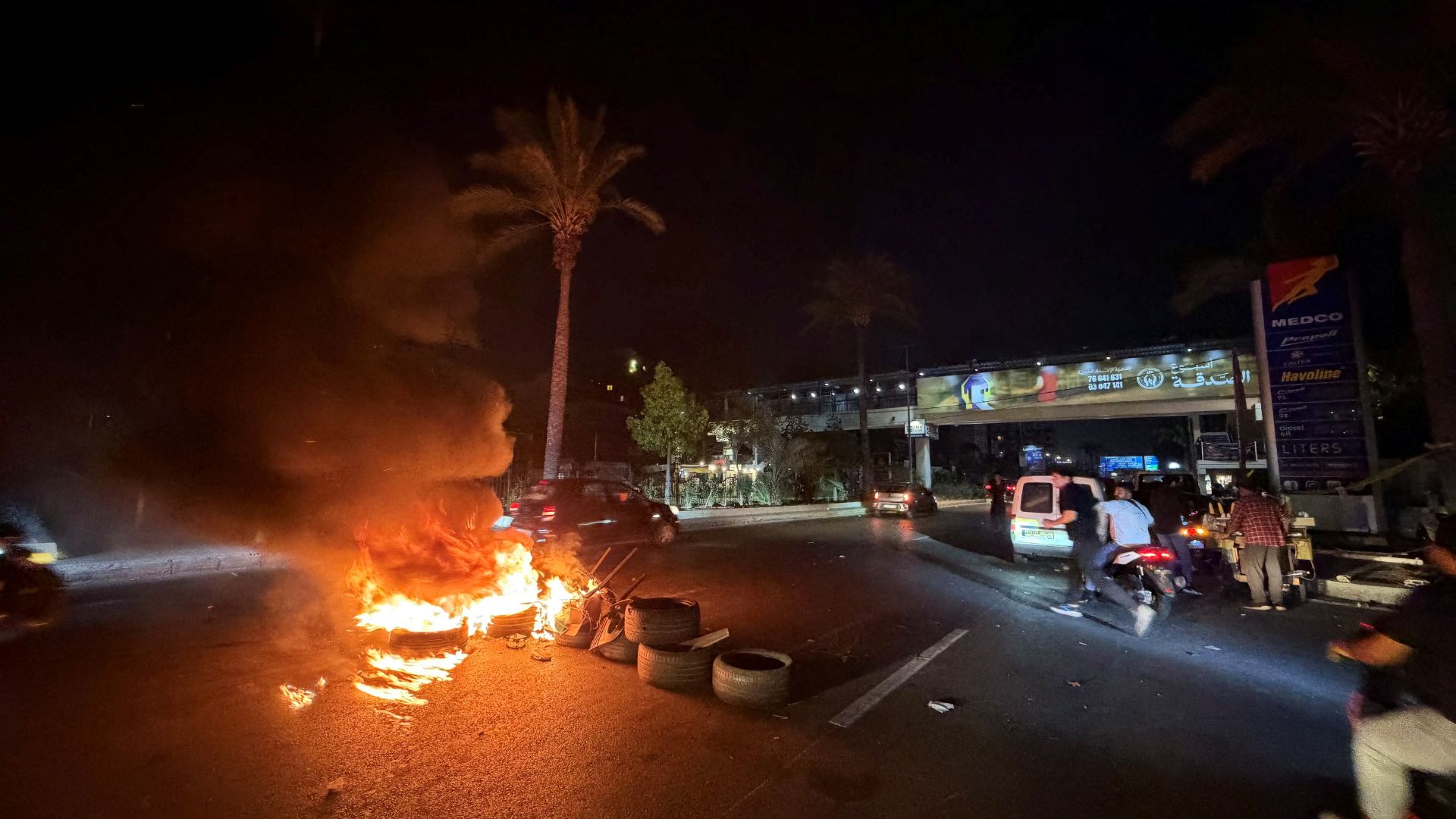 Hezbollah protestors flood Beirut's streets in protest at Israel-Lebanon framework signed in Washington on Friday. AFP.