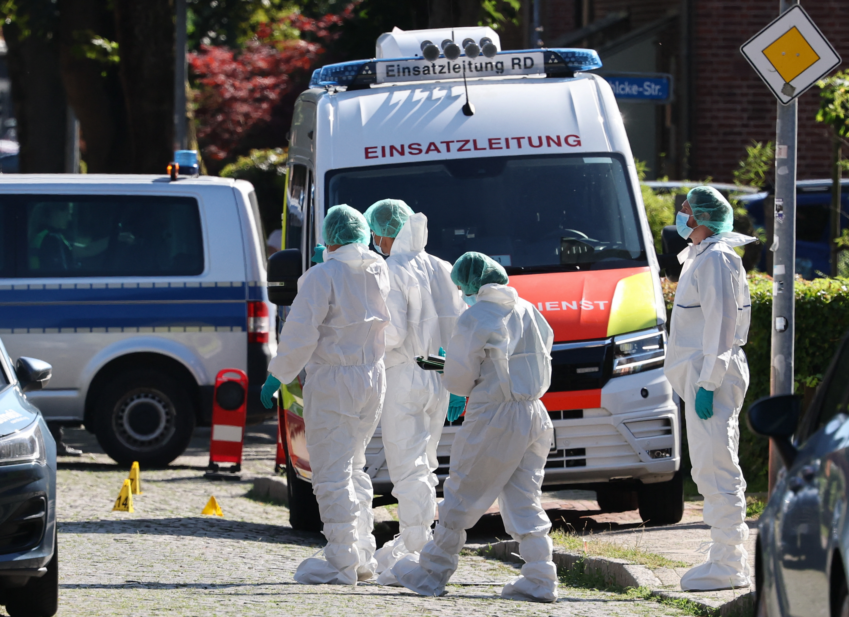 Police forensics work at the scene where six people were killed in a shooting in Stade, northern Germany. /Ibrahim Ot/AFP