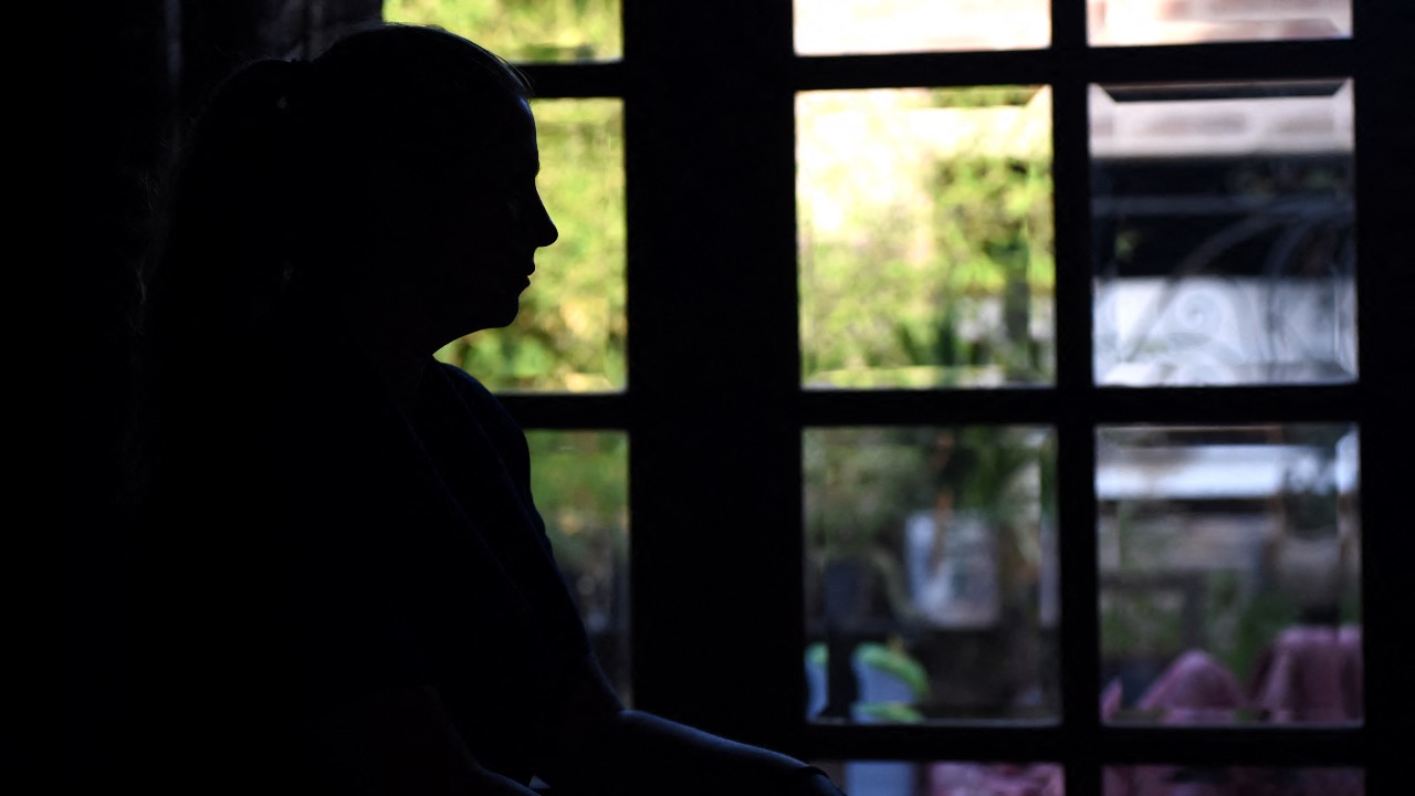 The Argentine woman who denounced two French rugby players for rape is pictured during an interview in Mendoza, Argentina, in December 2024. /Andres Larrovere/AFP