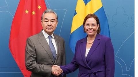 China's Wang Yi said China welcomed greater Swedish business engagement, noting that more than 10,000 Swedish companies currently trade with China. /Xinhua