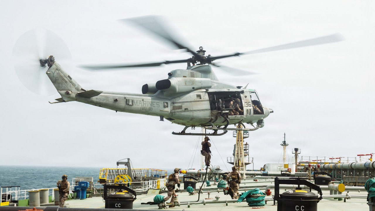 This US Marine Corps handout photograph taken on July 16 shows US Marines from the 11th Marine Expeditionary Unit conducting a verification boarding aboard M/T Wen Yao in the Gulf of Oman. /US Marine Corps/AFP