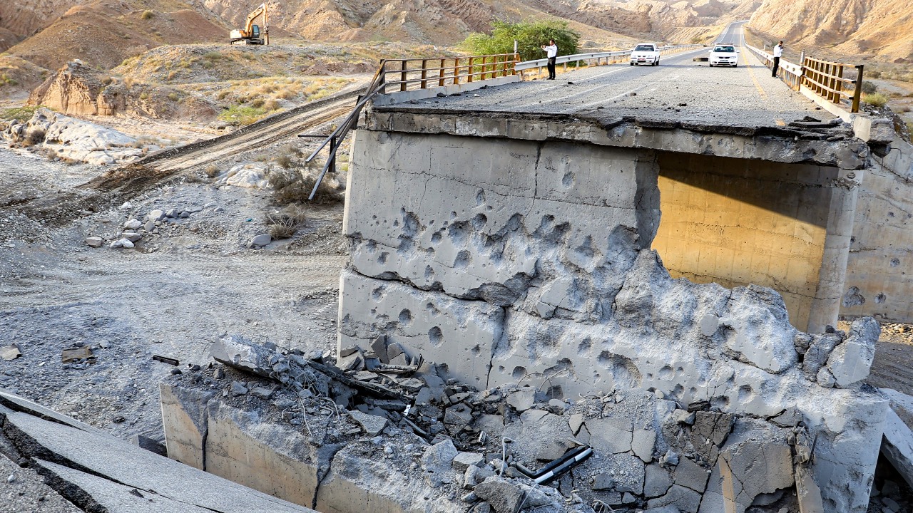 A heavily-damaged bridge which was hit by a US strike along the road connecting Roudan and Bandar Abbas in southern Iran. Amir Hossein Khorgooei/ISNA/AFP