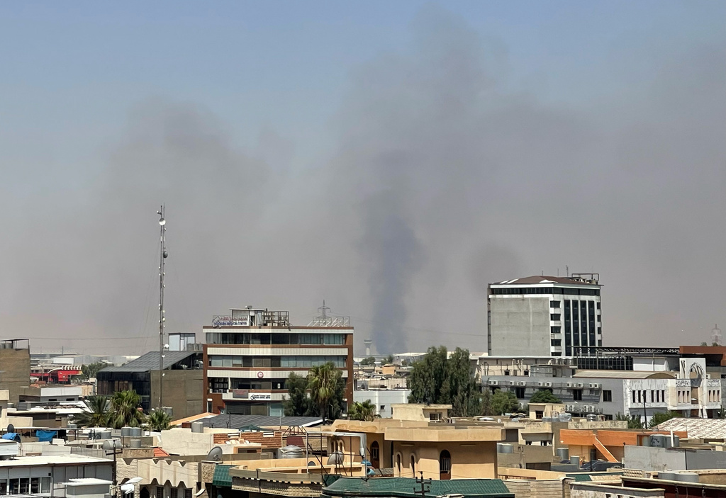 Black smoke rises following explosions near a military base hosting US forces in the northern Iraqi city of Irbil, Friday, July 24, 2026. /Stella Martany/AP