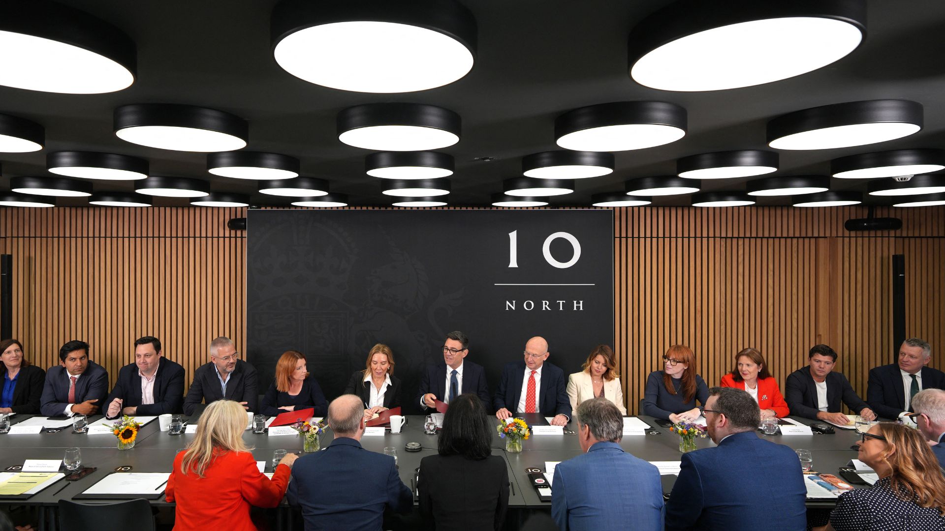 The branding of No. 10 North uses the famous black door back in London as inspiration. /AFP