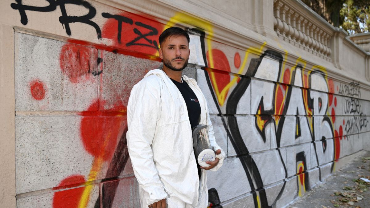 Valerio Tuveri is waging a war against Rome's graffiti, like this on the city's Villa Sciarra walls. /AfP.