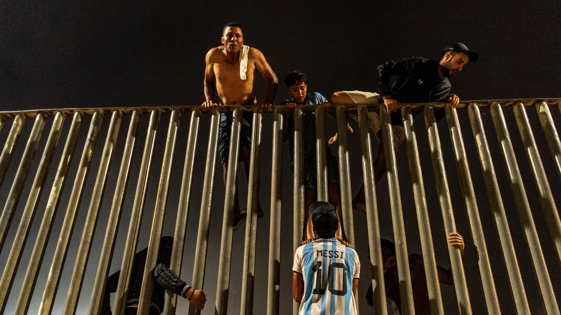 Migrants try to cross from Morocco into the Spanish enclave of Ceuta, Friday, July 31, 2026. /Antonio Sempere/AP