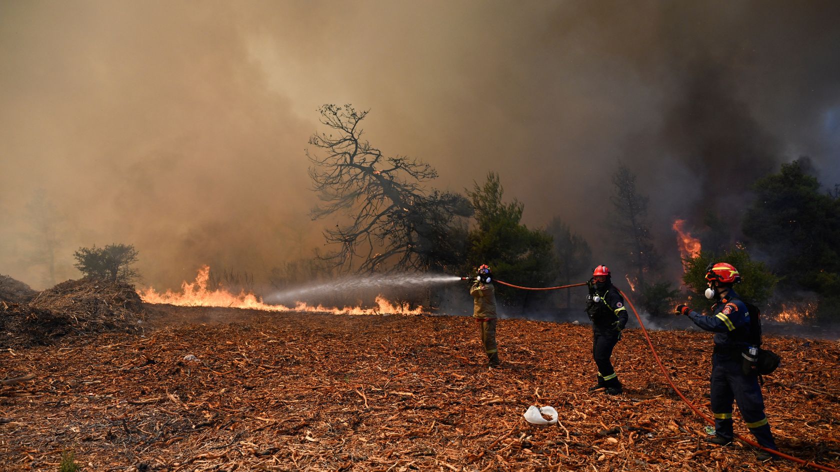 High windspeeds have forced fresh evacuations across the Athens area, with firefighters working around the clock to manage the blaze. /AP.