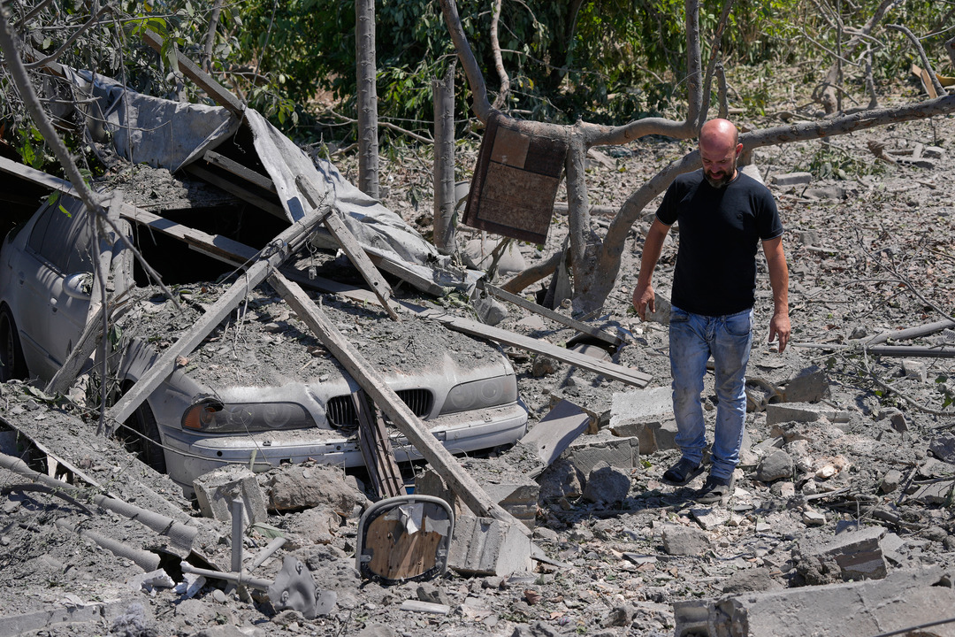 A man checks the site of a destroyed house that was hit in an Israeli airstrike in the village of Burj al-Shamali, southern Lebanon, Thursday, Aug. 6, 2026. /AP Photo, Mohammed Zaatari