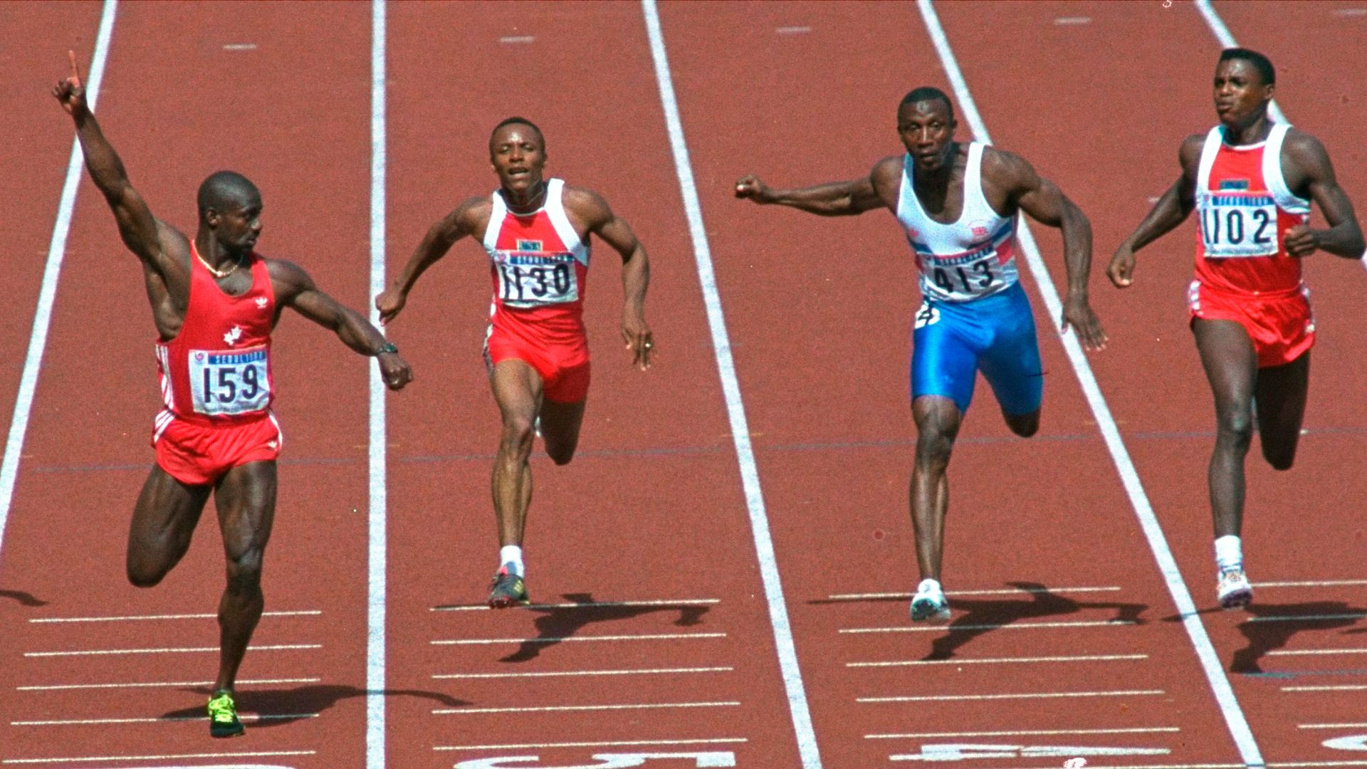 Ben Johnson, left, wins the Dirtiest Race in History. /Ira Gostin/AP