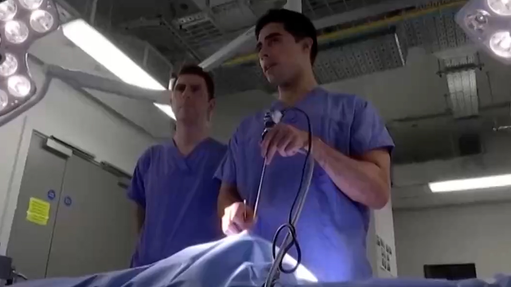 Dr Hani Marcus and Dr Danyal Khan operating on a patient using the AI tool. /Reuters