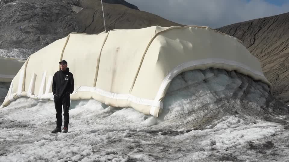 Researchers in the Alps are testing whether wool can help protect ice from summer heat. /Reuters