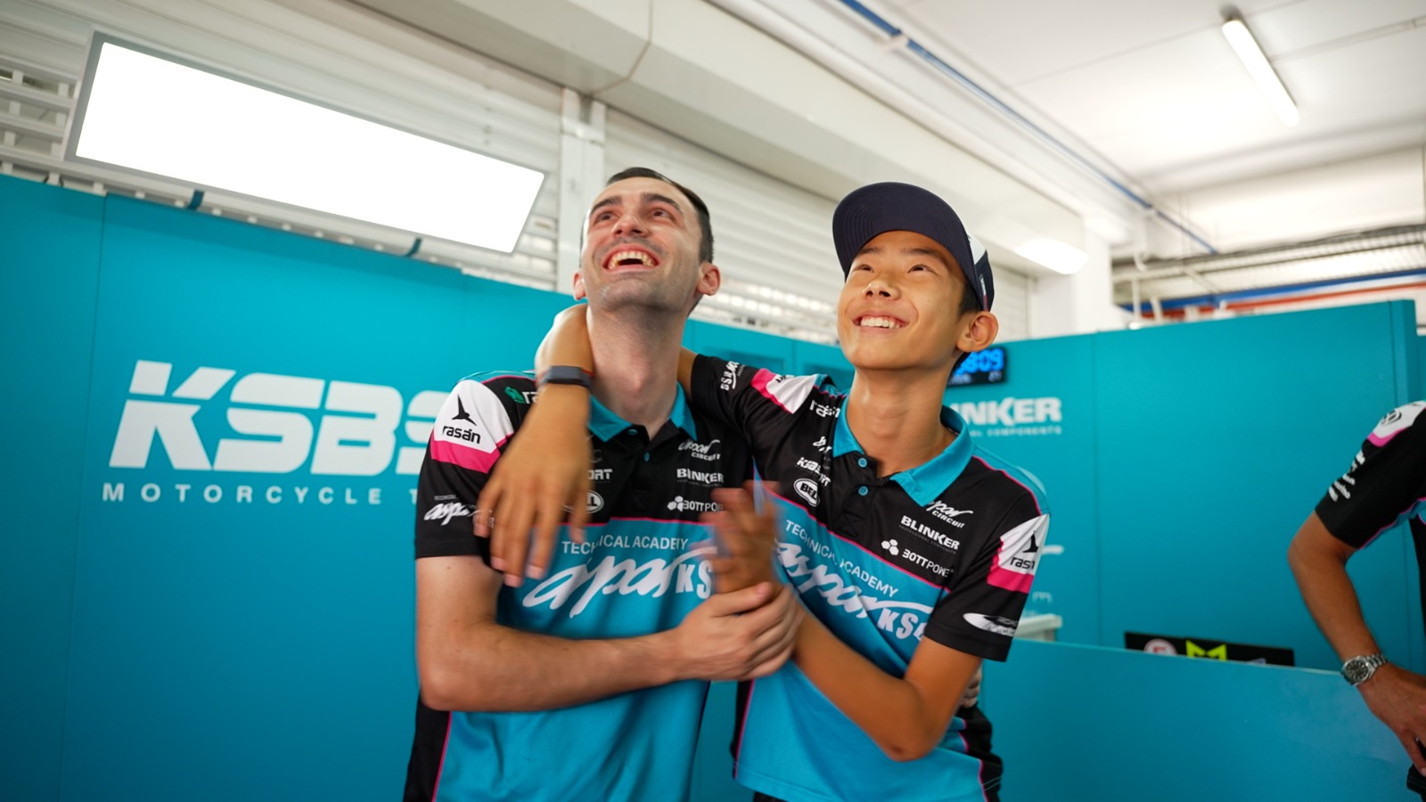 'We're like a family' – Eddie Sun chas fun with the CFMOTO ASPAR Team in Valencia. /Ken Browne/CGTN