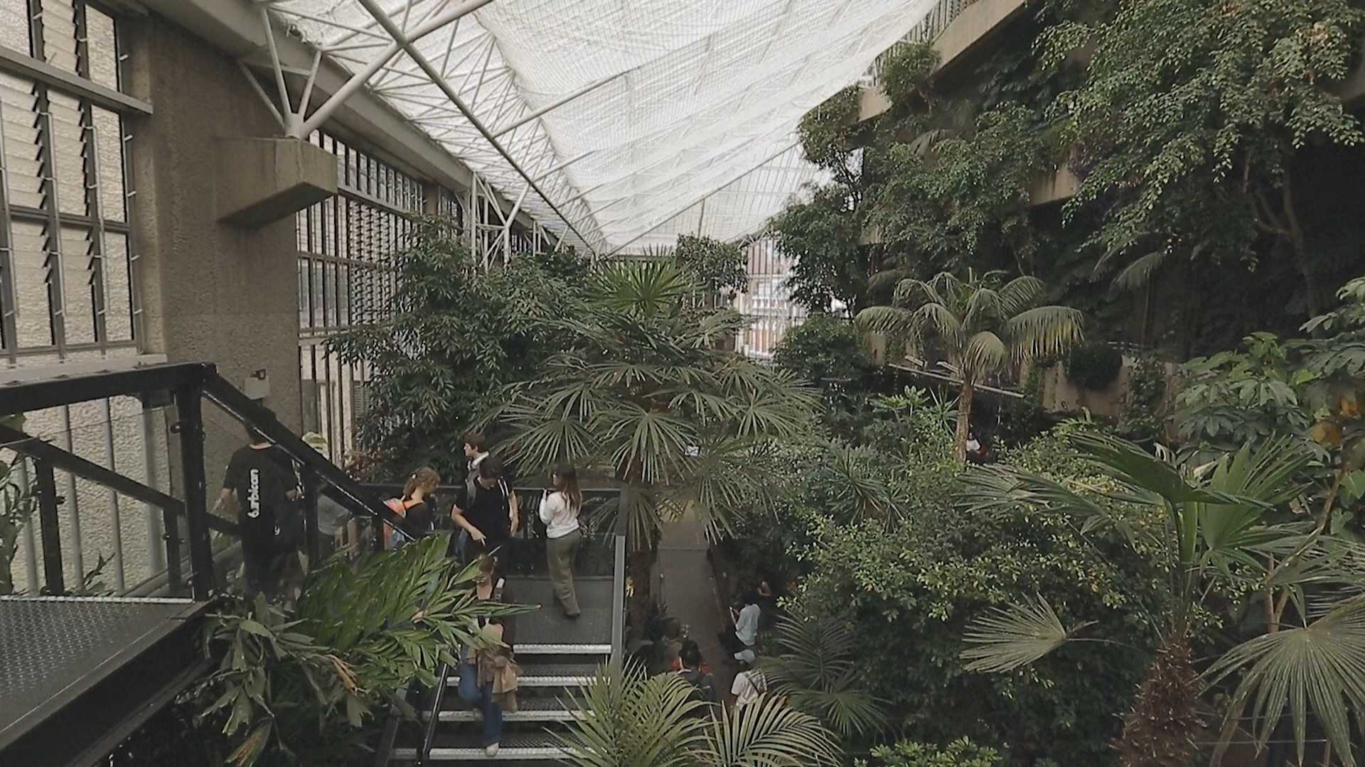 The foliage of the conservatory counterpoints the beloved Barbican brutalist architecture. /Reuters