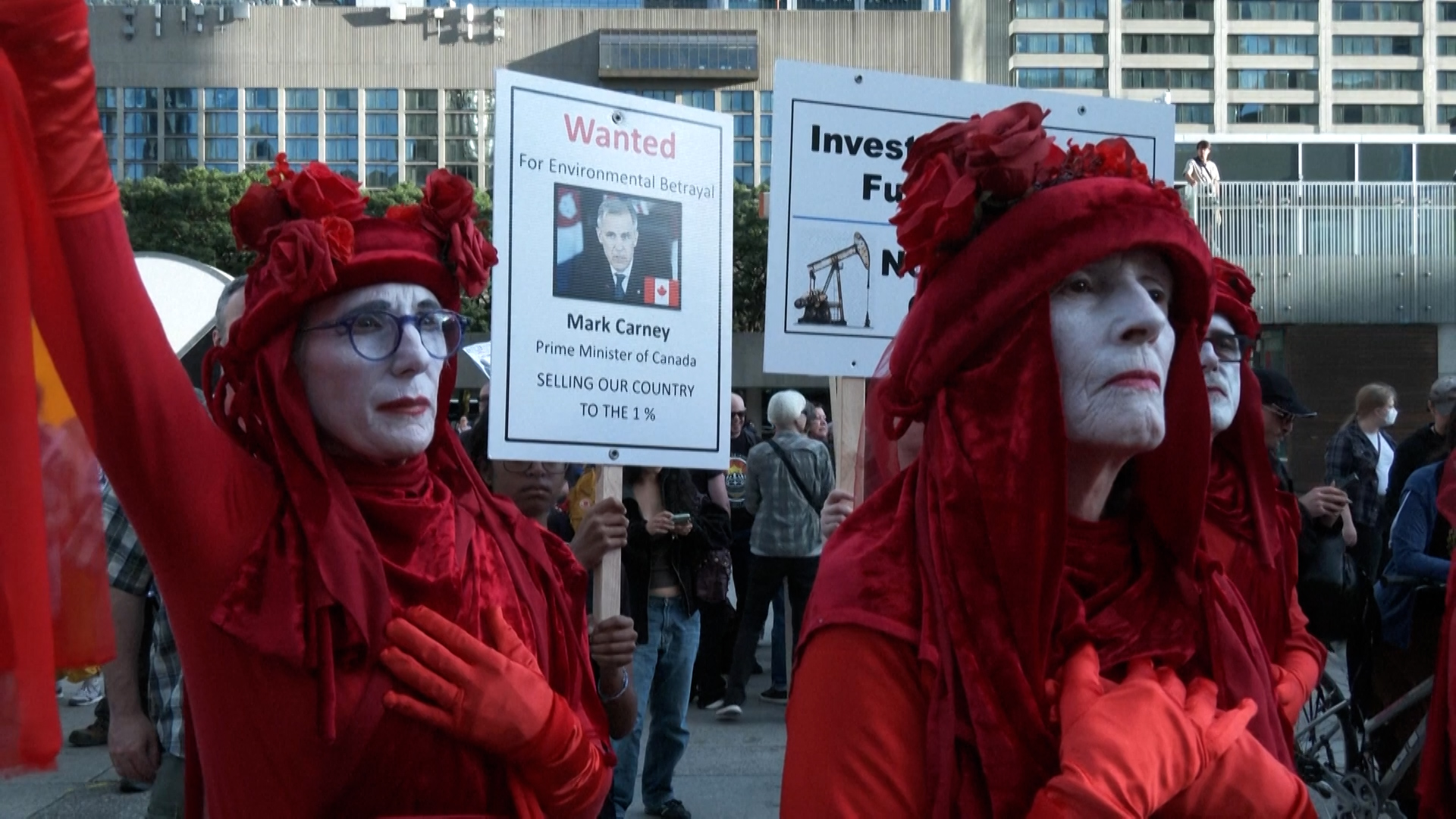 Hundreds march in Toronto against Carney's investment summit on September 15, 2026. /Reuters