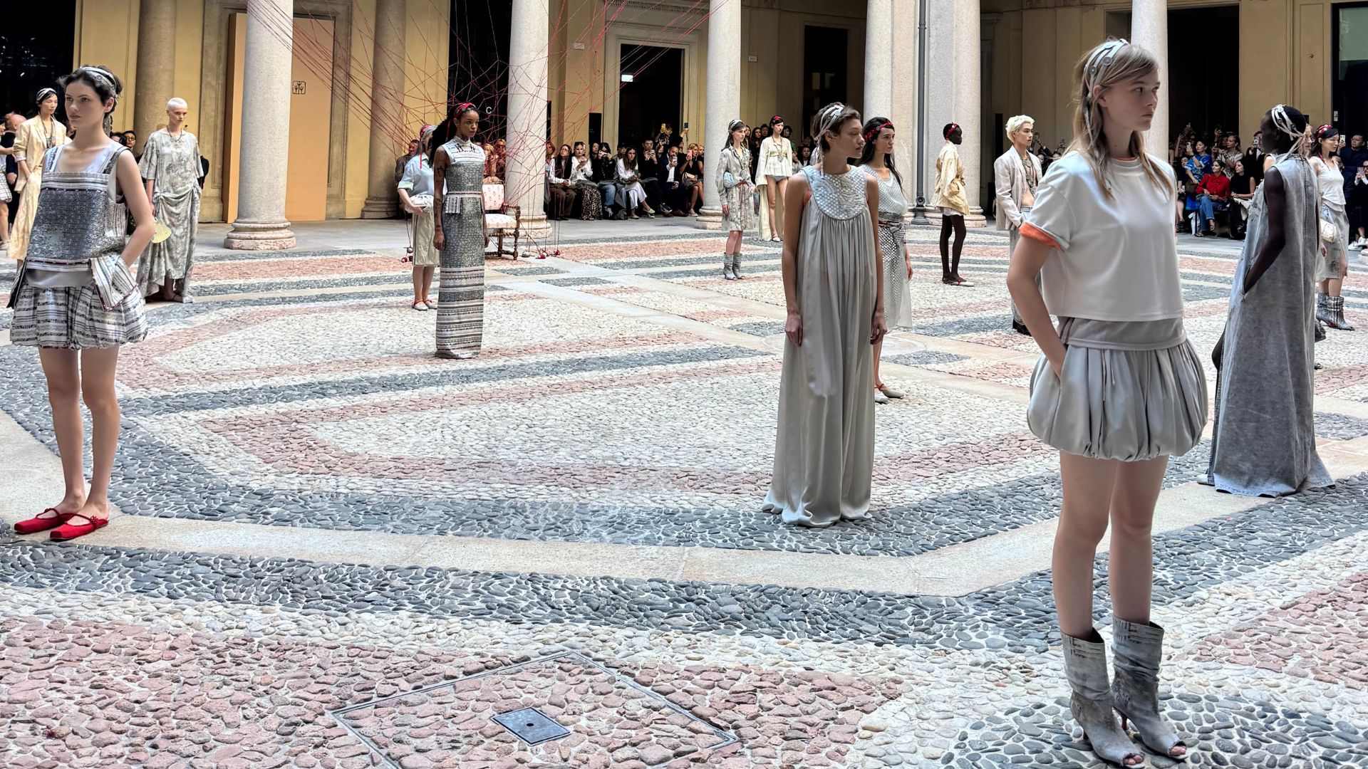 Models showing Hui's designs at the historic Palazzo Turati. /CGTN