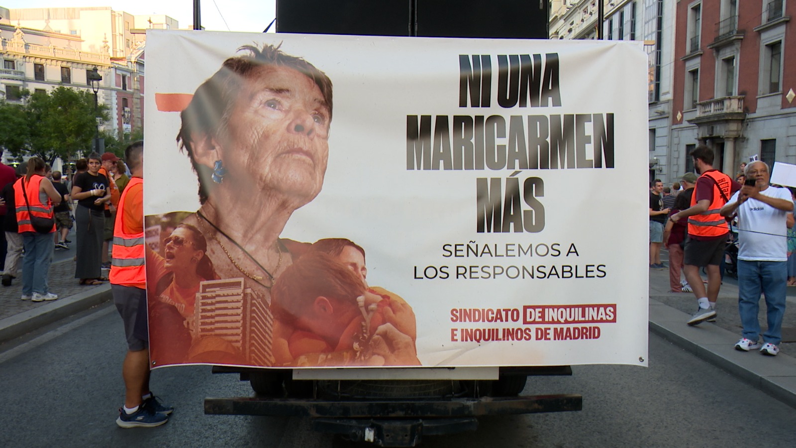 'No More Maricarmens' reads a sign at the protest on Saturday. /Ken Browne/CGTN