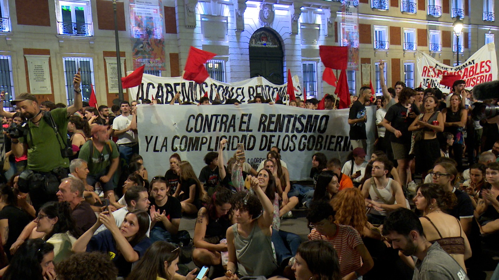 A sit-in protest with hundreds of people sleeping in tents for days outside the Madrid regional government offices – the same spot where the 15M protests changed Spanish politics forever. /Ken Browne/CGTN