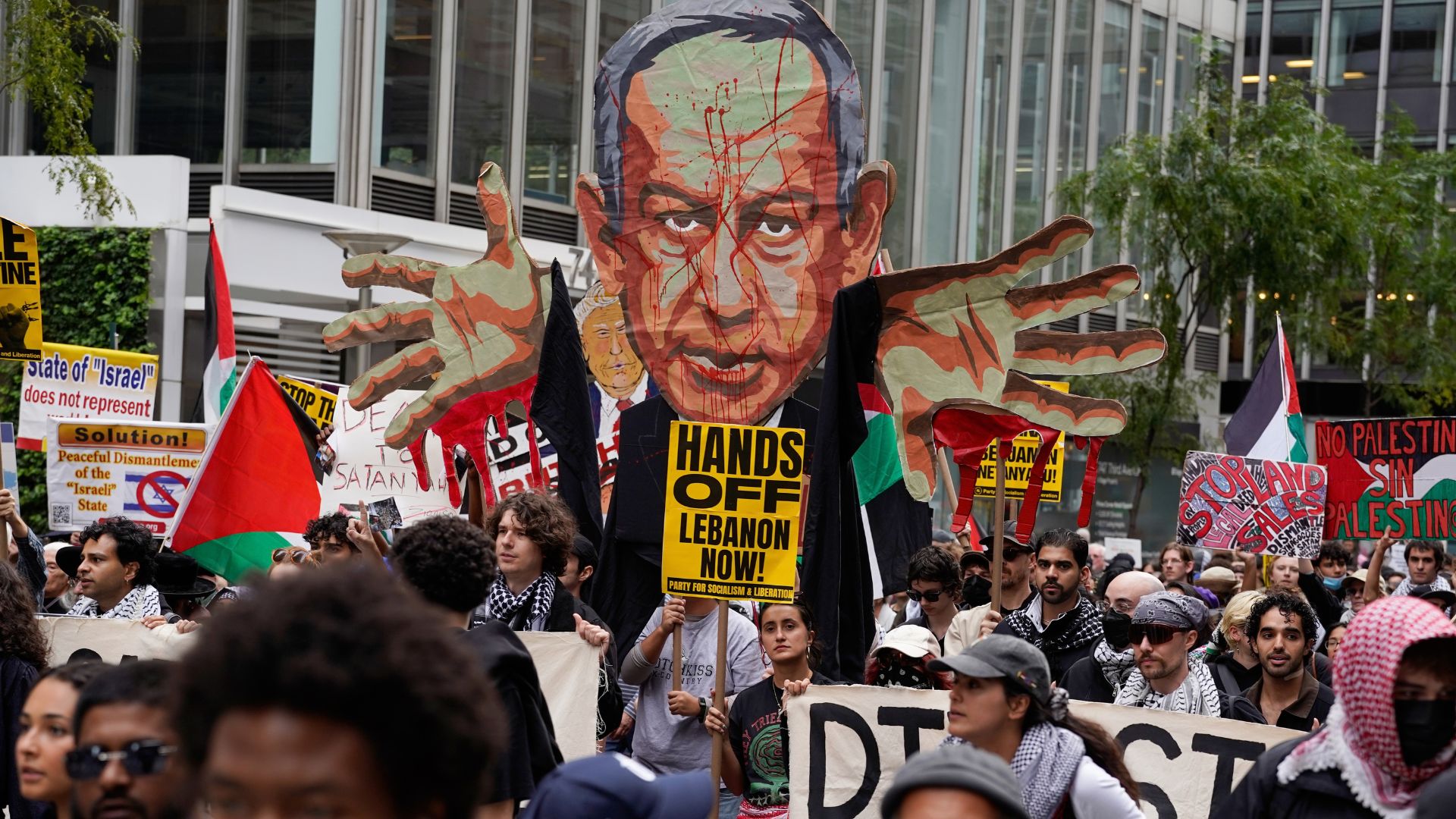 As Netanyahu took to the stand in the United Nations General Assembly, protesters gathered outside to demand his arrest. /AP.