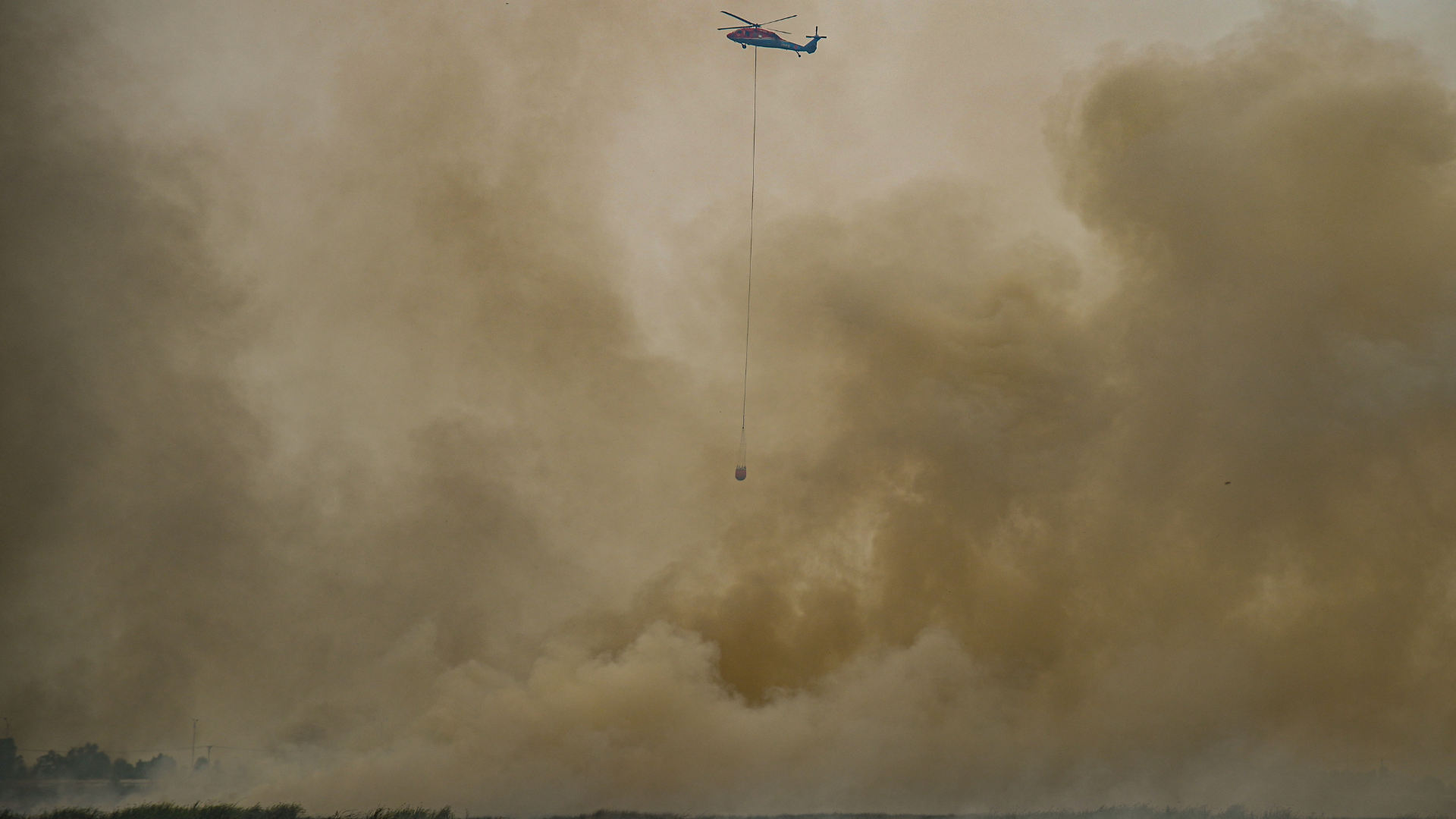 Events such as wildfires have contributed to poor air quality. /Al Zulkfli/AFP
