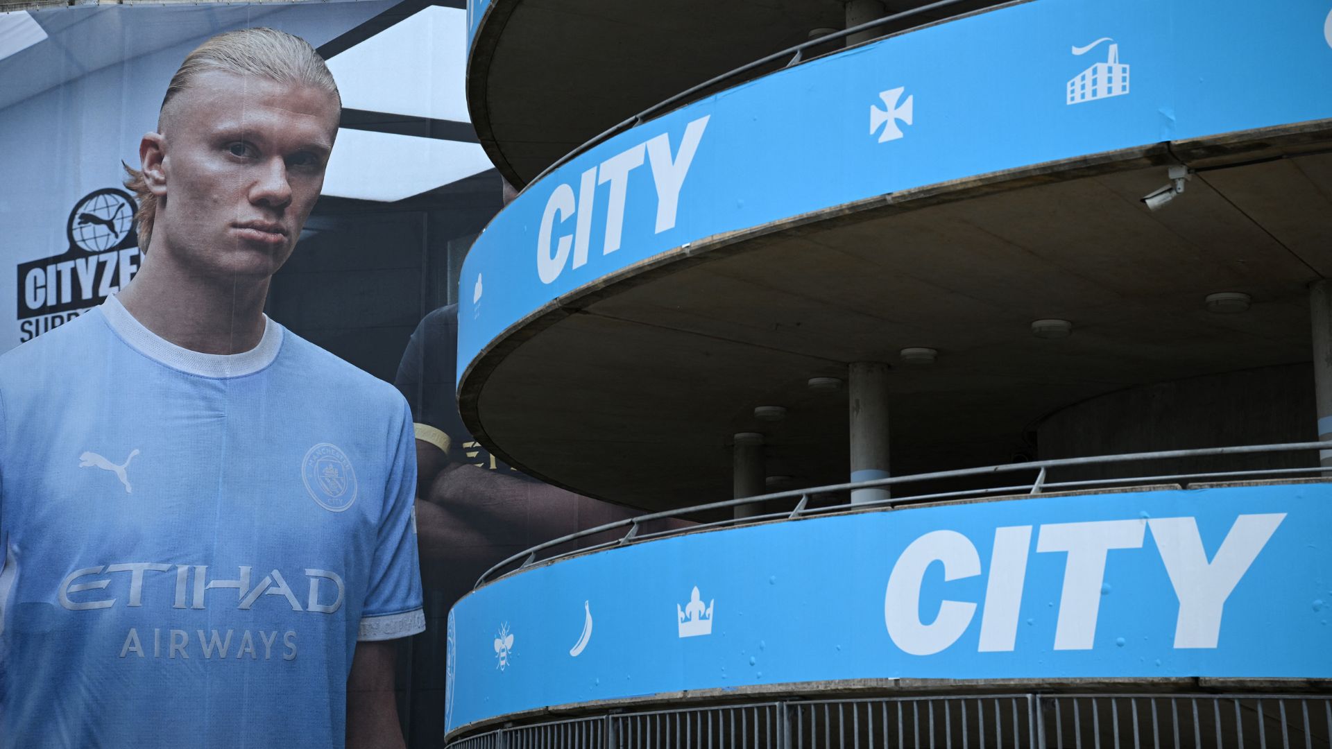 A poster at the Etihad Stadium of Manchester City's star striker Erling Haaland. /Oli Scarff/AFP