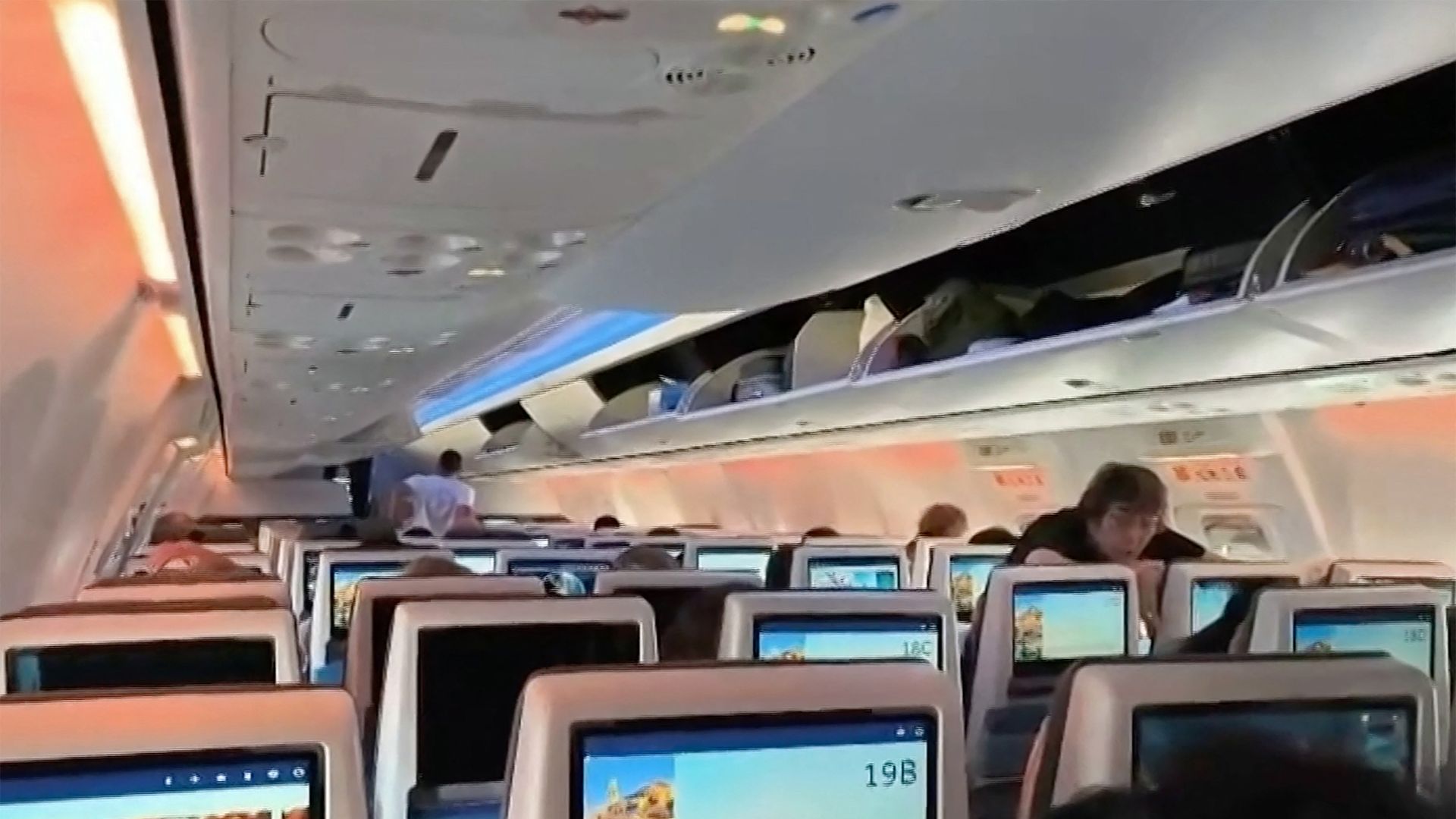 Passengers inside the rerouted flydubai flight FZ1073 await its departure to Tel Aviv from Saudi Arabia’s Tabuk airport. /AFPTV/AFP

